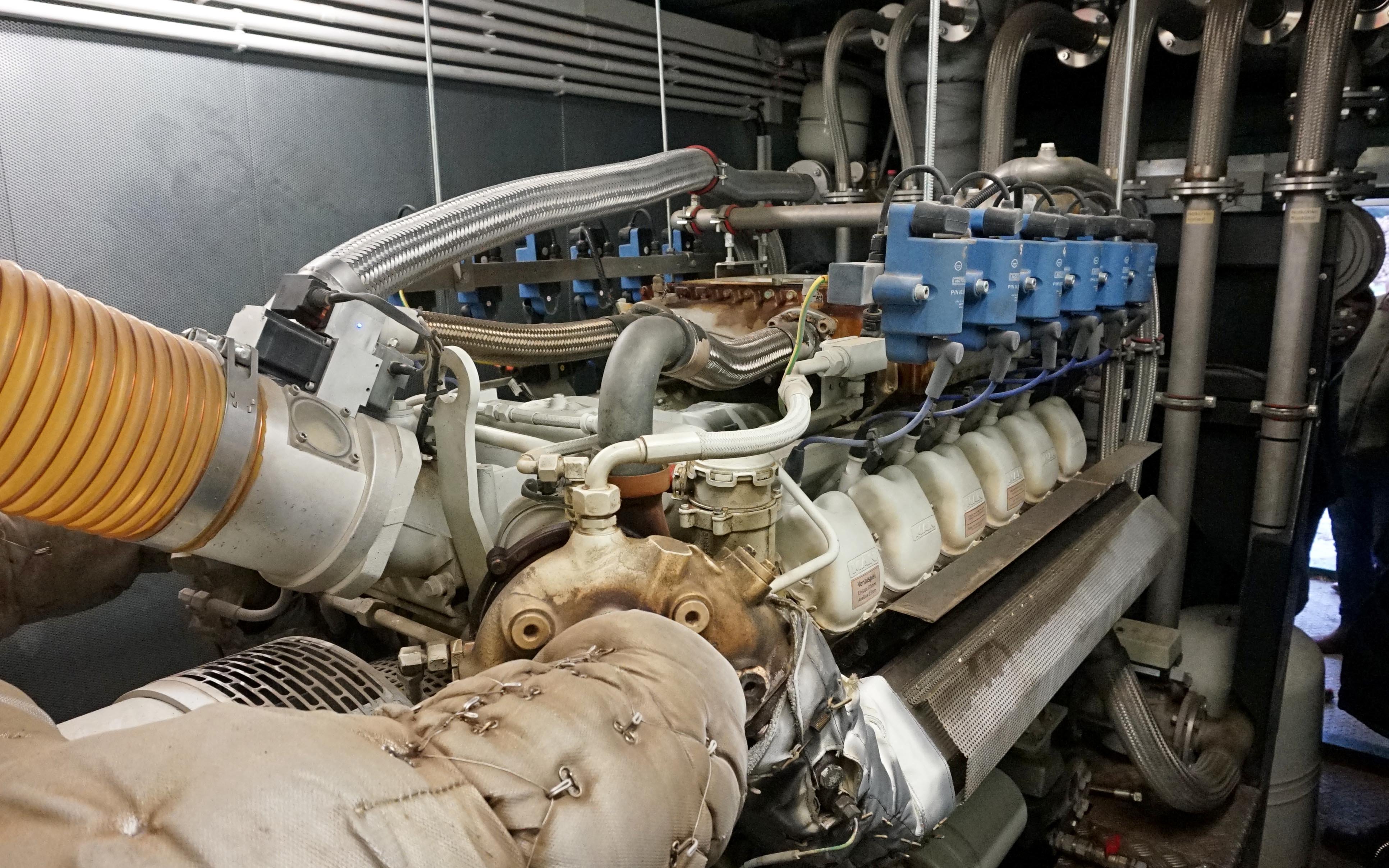 Hot water and air are drawn off from the two MAN V12 engines