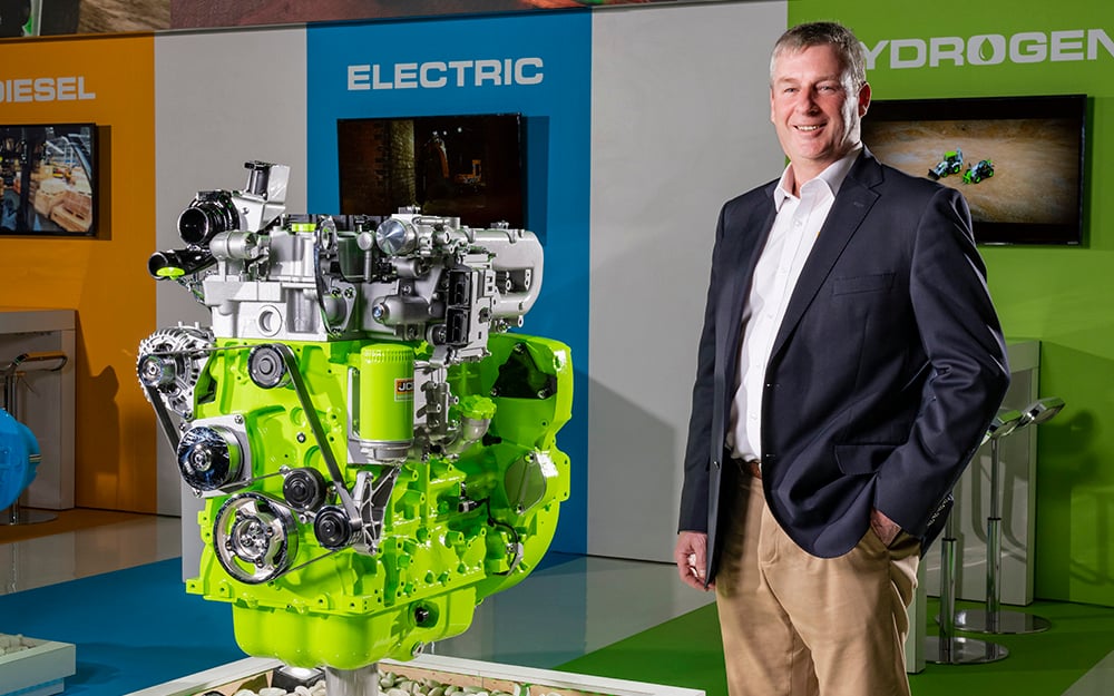 Tim Burnhope of JCB with the company's 448 ABH2 purpose designed hydrogen engine