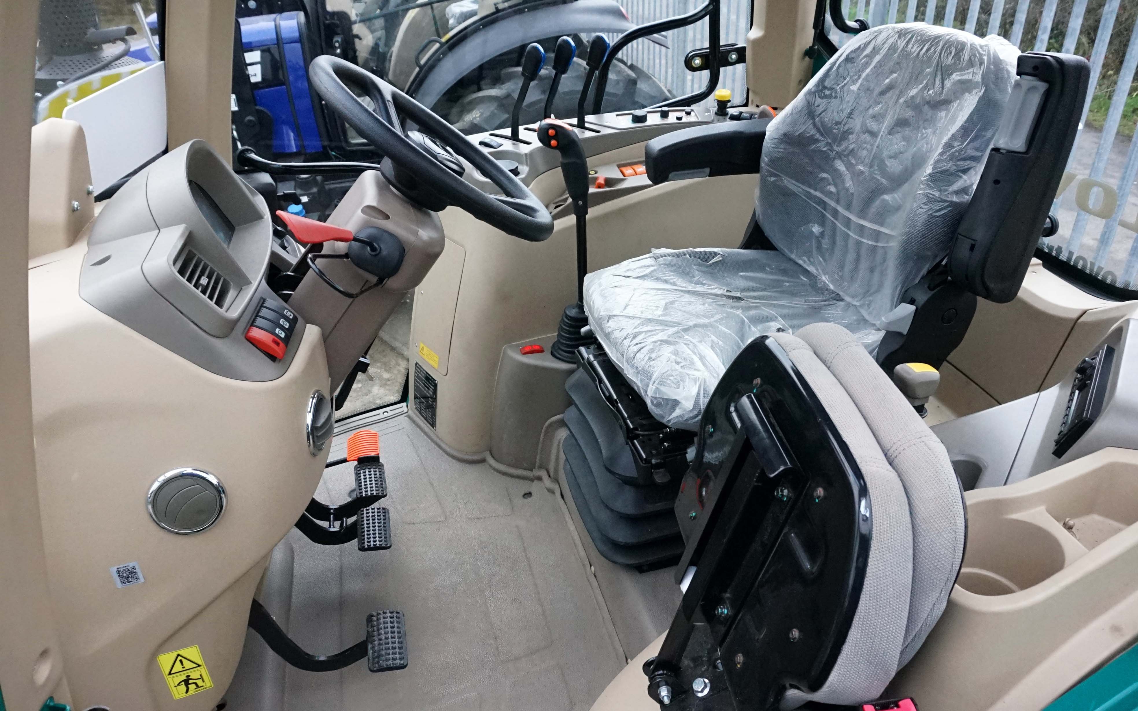 The cab interior of the PS130 is light and airy, with excellent forward visibility thanks to the curved back windscreen