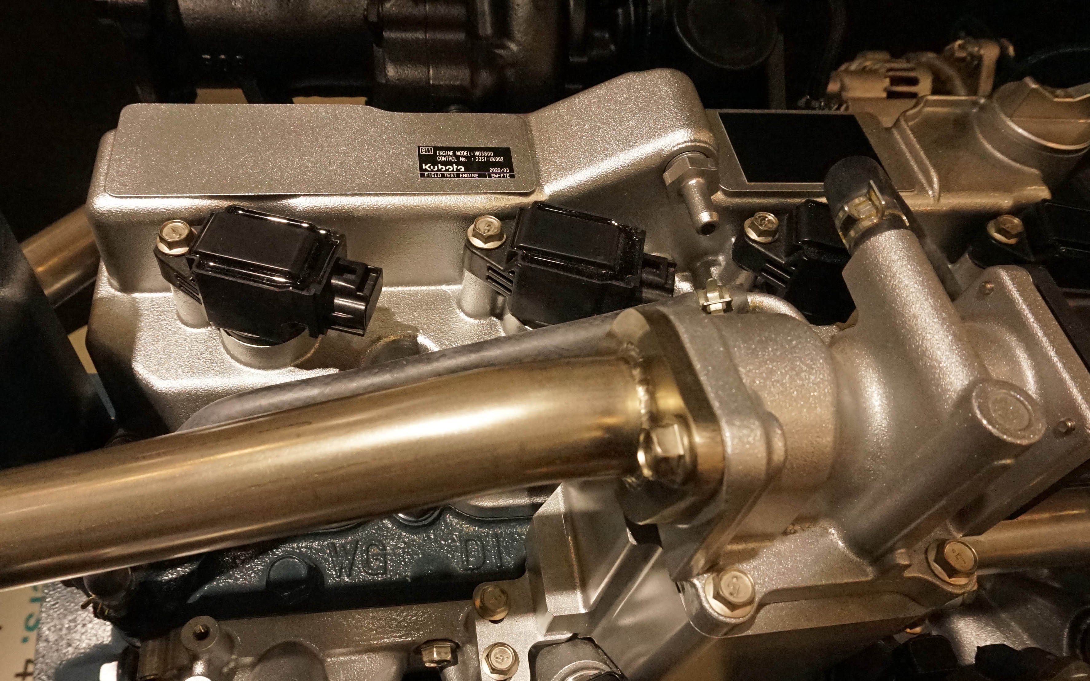 Spark plugs now sit where injectors one resided