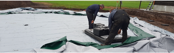 Laying out the tank liner