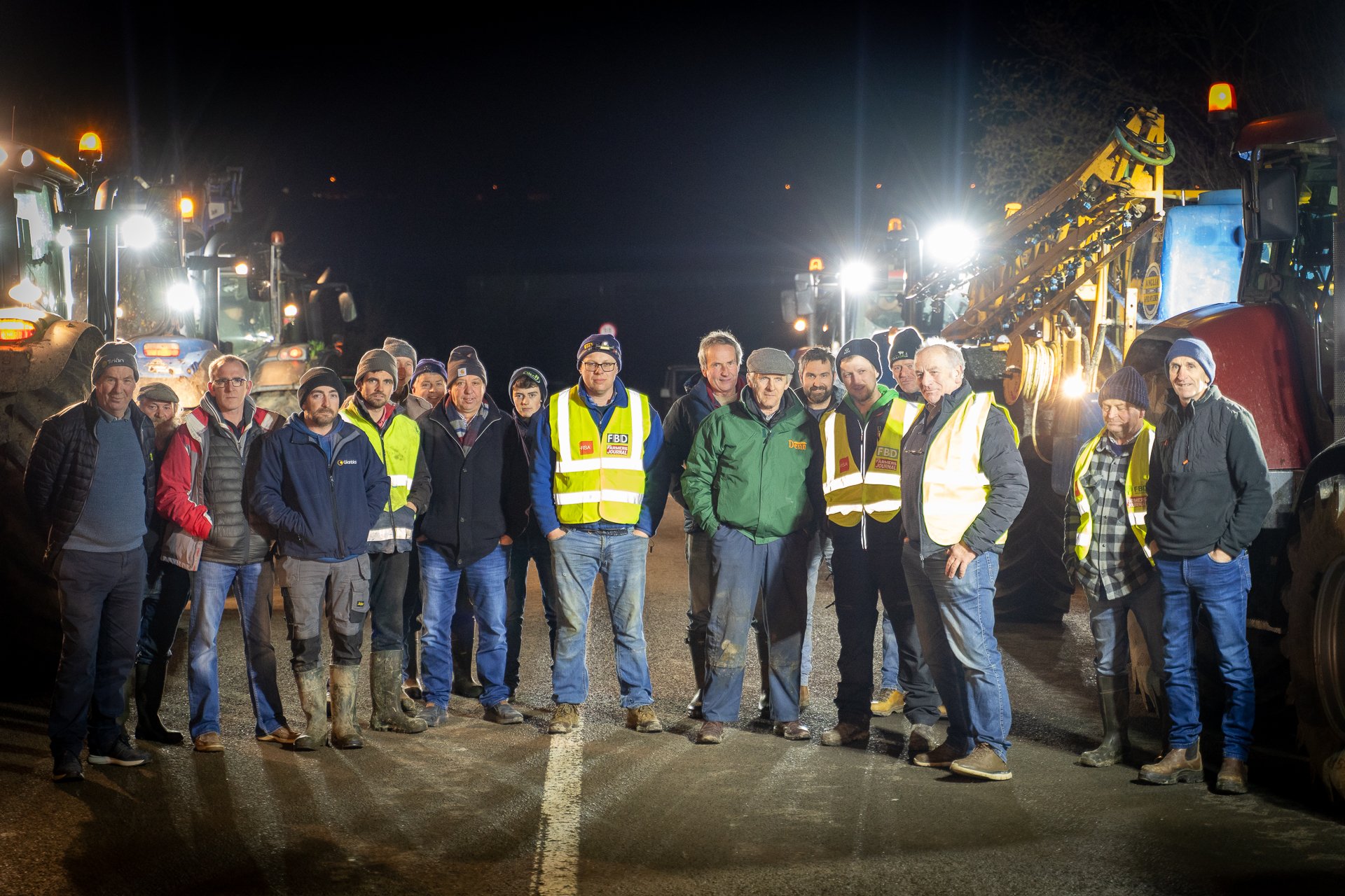 Farmers gathered on the bridge over the N25 in a show of solidarity. Image Source: Peter Phelan