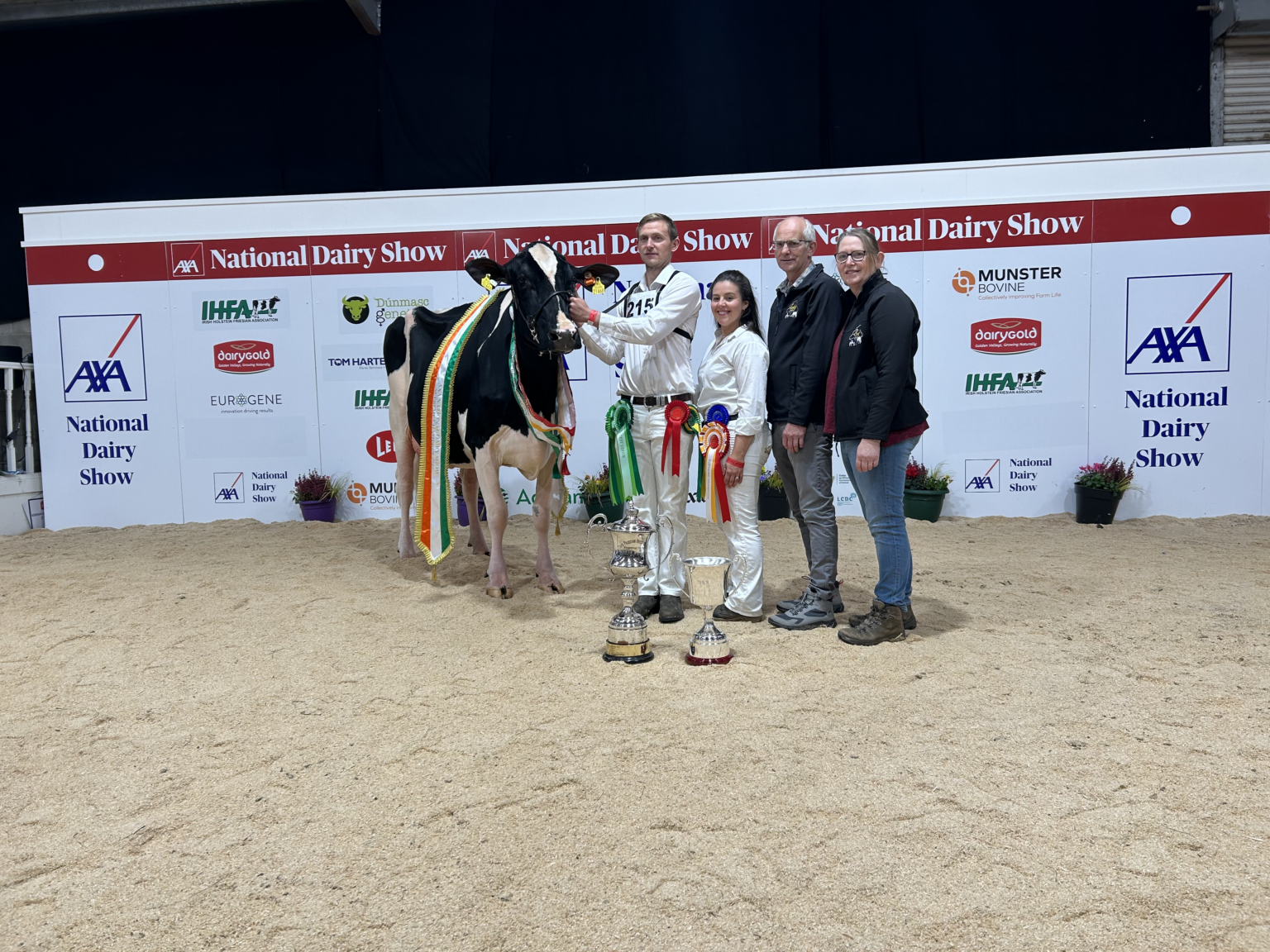 Eedy Doorman Fame was supreme champion of the AXA National Dairy Show (l-r) Jason, Laura, Robert and Silvia Helen