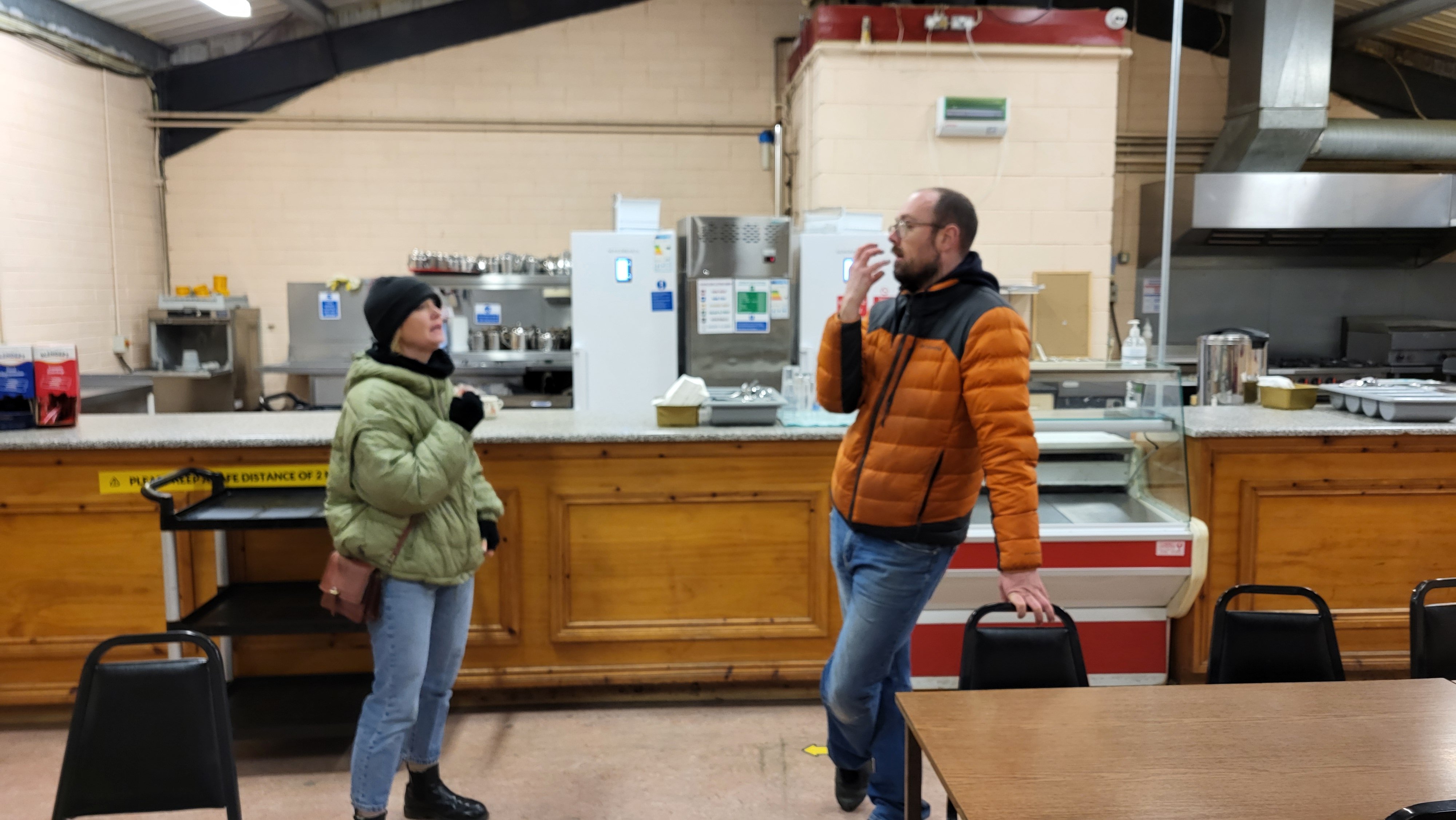 Director, Sonya O Donoghue and Cinematographer, Niall P Connor discuss shots in Gort Mart canteen. Photo source: Ruaidhrí Hallinan