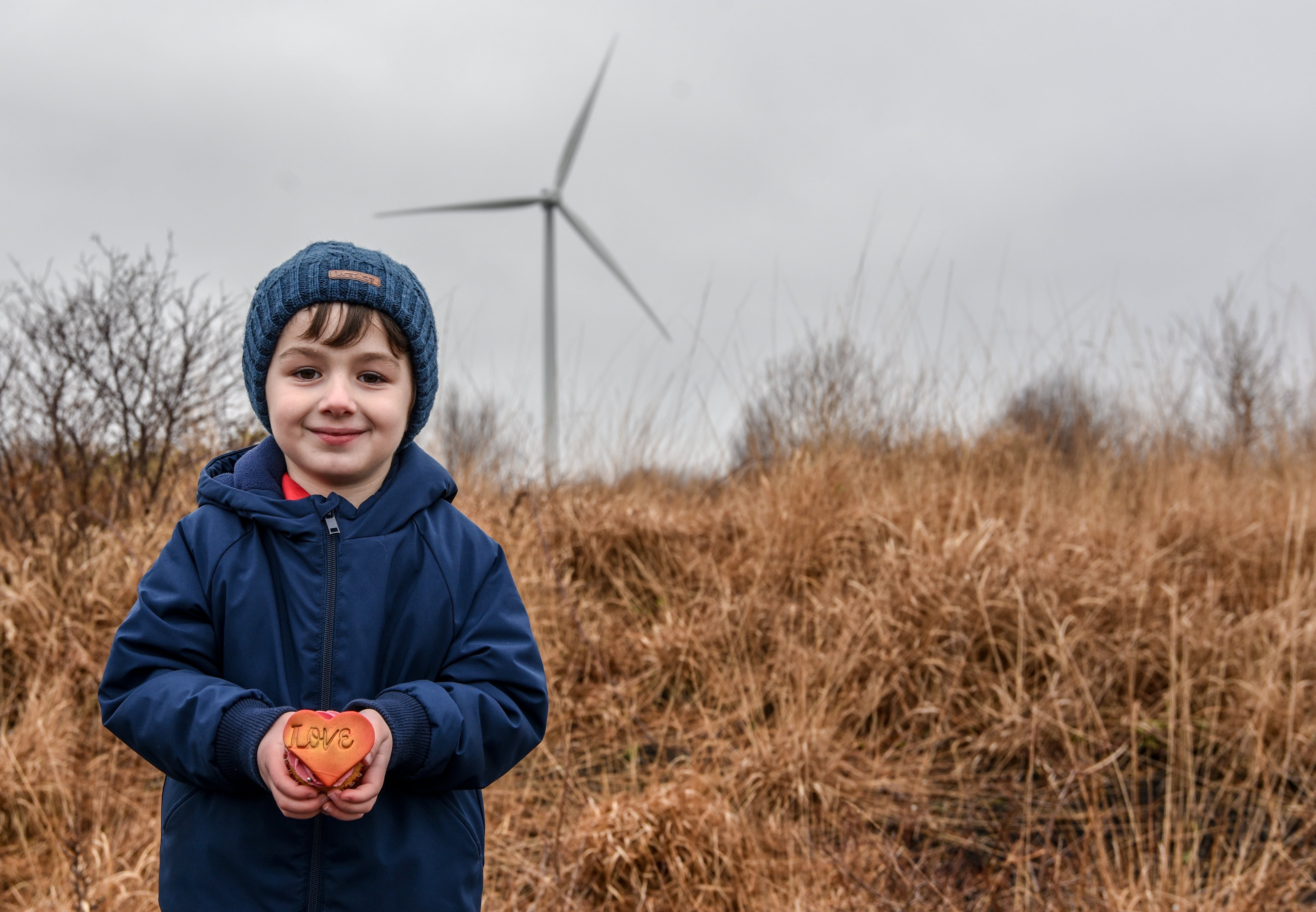 Elijah Brassil (Kildare) at his local wind farm, Mount Lucas, Daingean, Offaly. Image source: Kenneth Smyth
