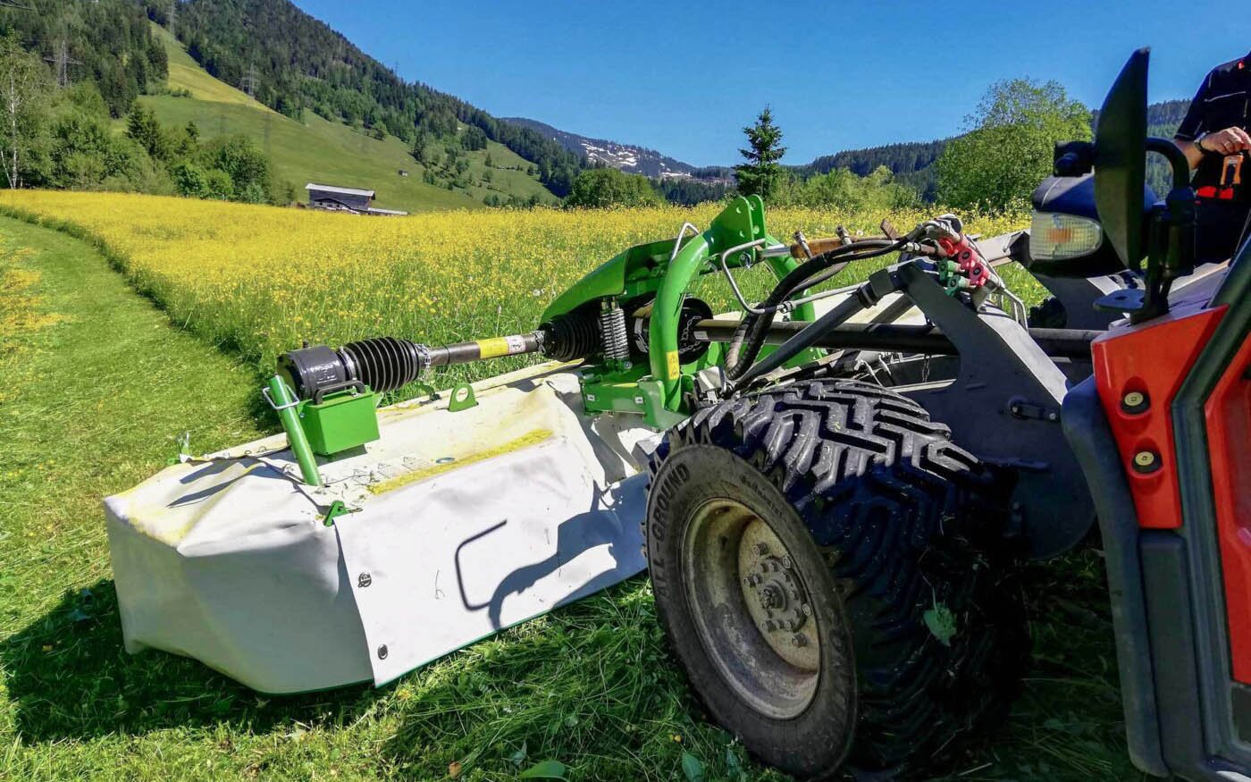 SaMASZ front-mounted mower has sideshift to allow it to work with wide tyres or dual wheels