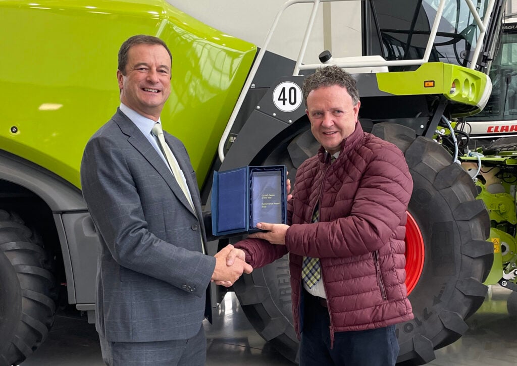Trevor Tyrrell, senior vice-president (western Europe and Oceania) and CLAAS UK CEO presenting the Dealer of the Year award to Maurice Kelly in November 2022. Trevor will be opening the event on Thursday evening