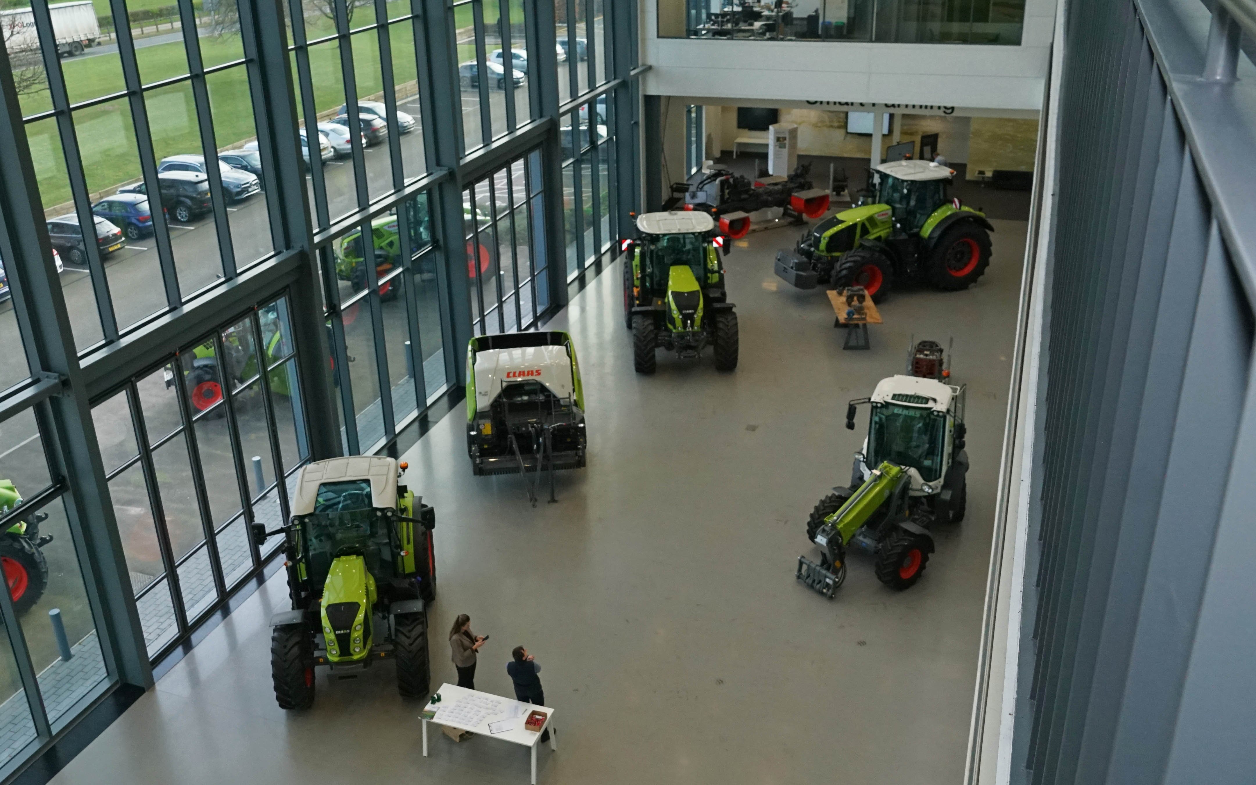 On the inside, the showroom extends all the way up to the roof of the building, giving the impression of being out in the open