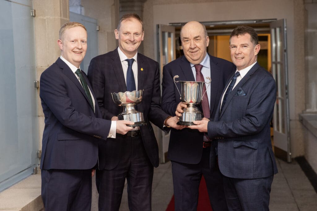 UFU president David Brown with the NW Armagh group managers who won both the Mary Wilson Trophy and Cuthbert Trophy Source: UFU