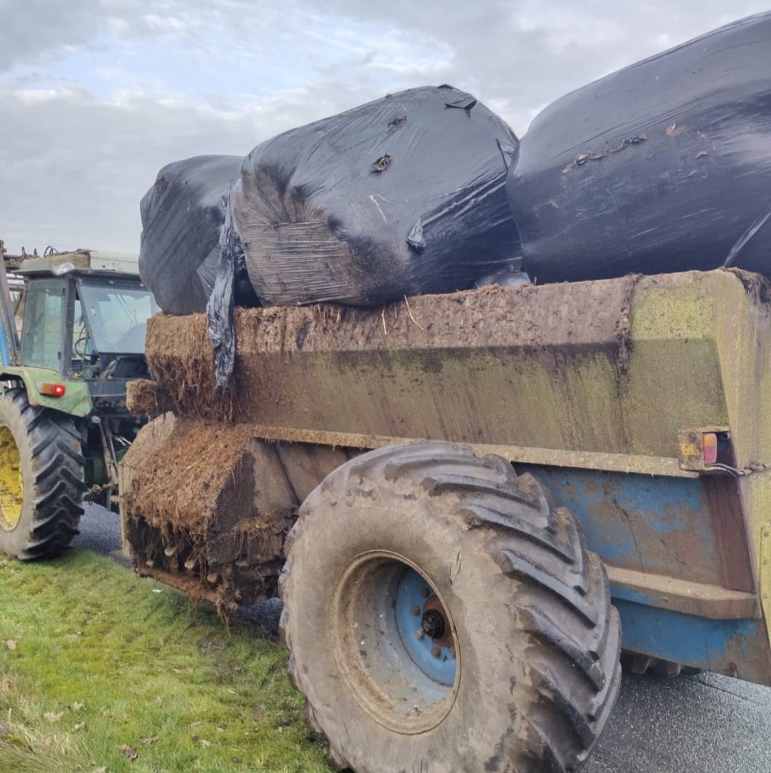 Bales on dung spreader Image source: Garda Facebook