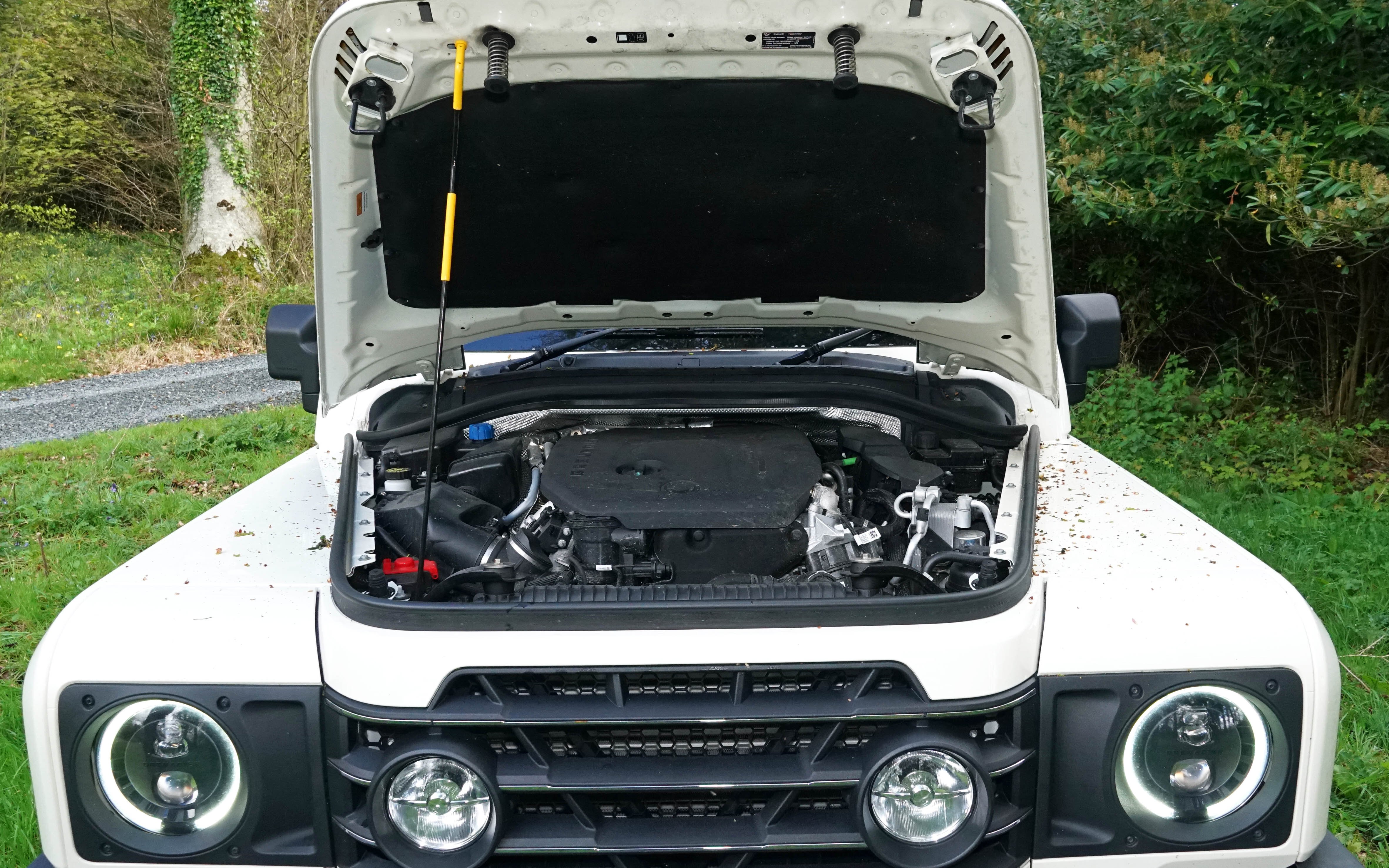 The wing styling is carried over from the Defender with the particular curvature being due to the  limitations of bending post war aluminium.