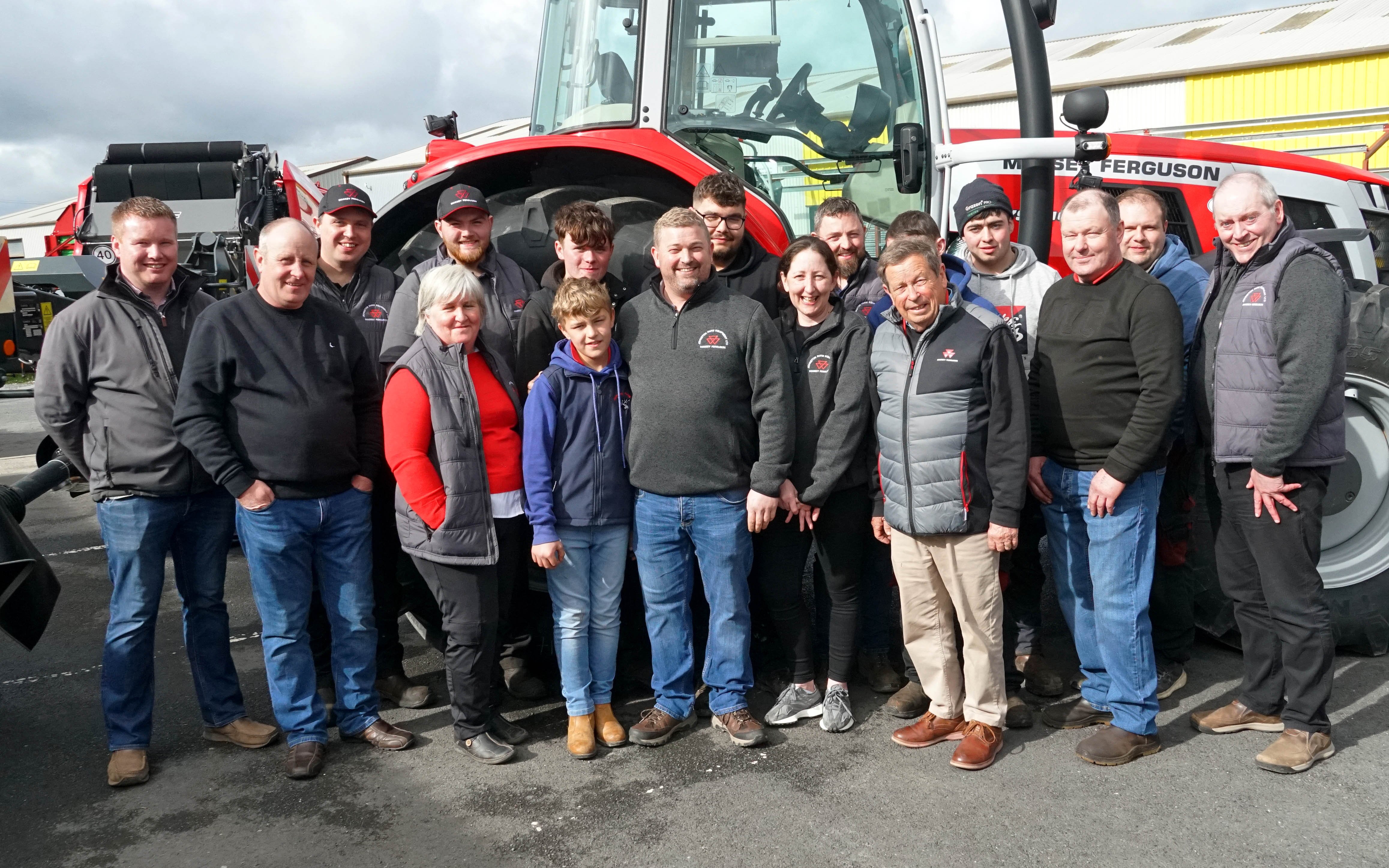 The staff at Johnston Farm Equipment line up for the occasion