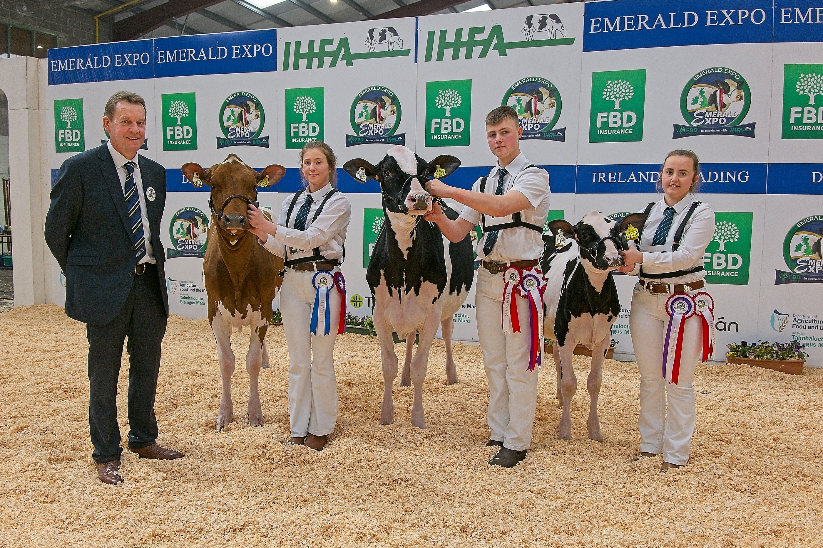 Winners of the Handler Championship sponsored by FBD. L-r: Show judge David Booth; honourable mention Sarah Williamson; champion Will Jones; reserve champion Rachel Corley