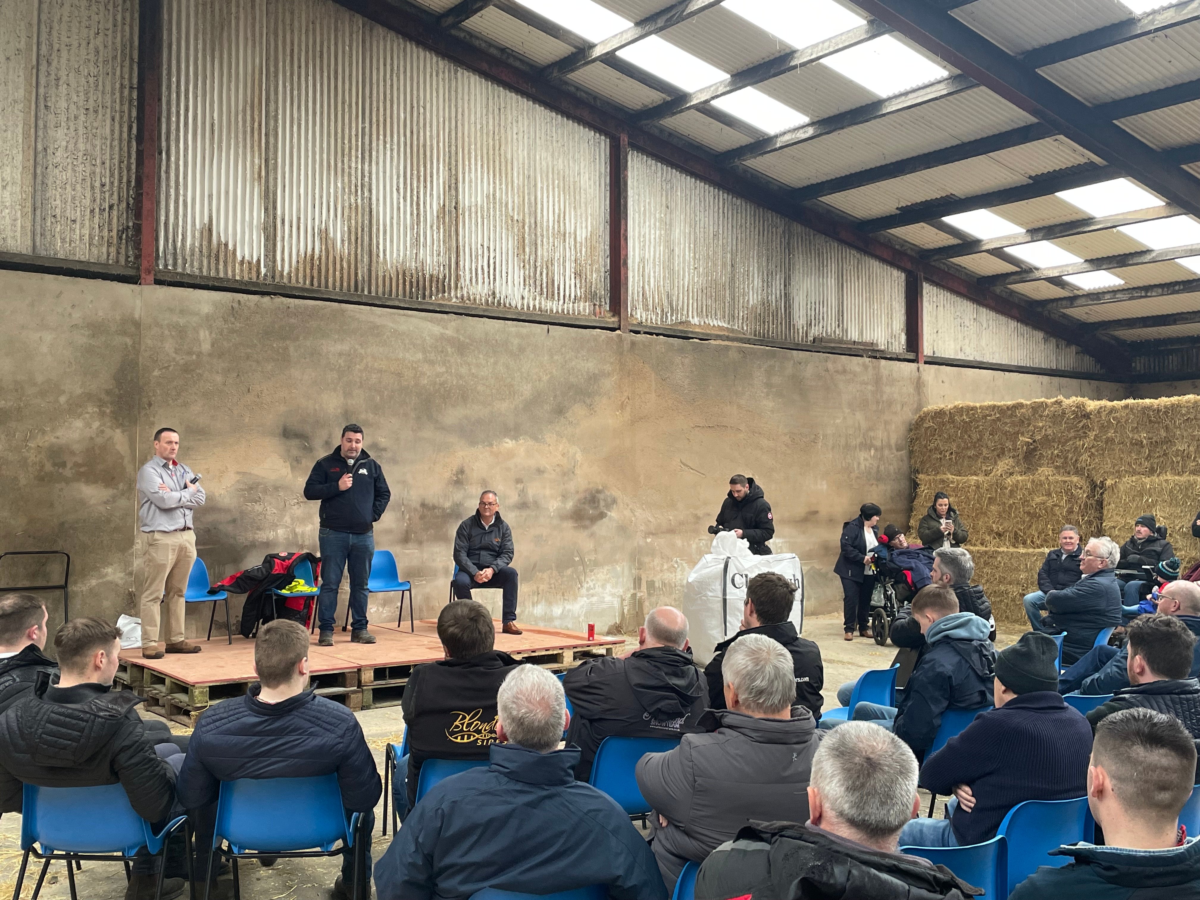 John Mitchell (centre) taking questions from farmers at the open day on the Mitchell farm