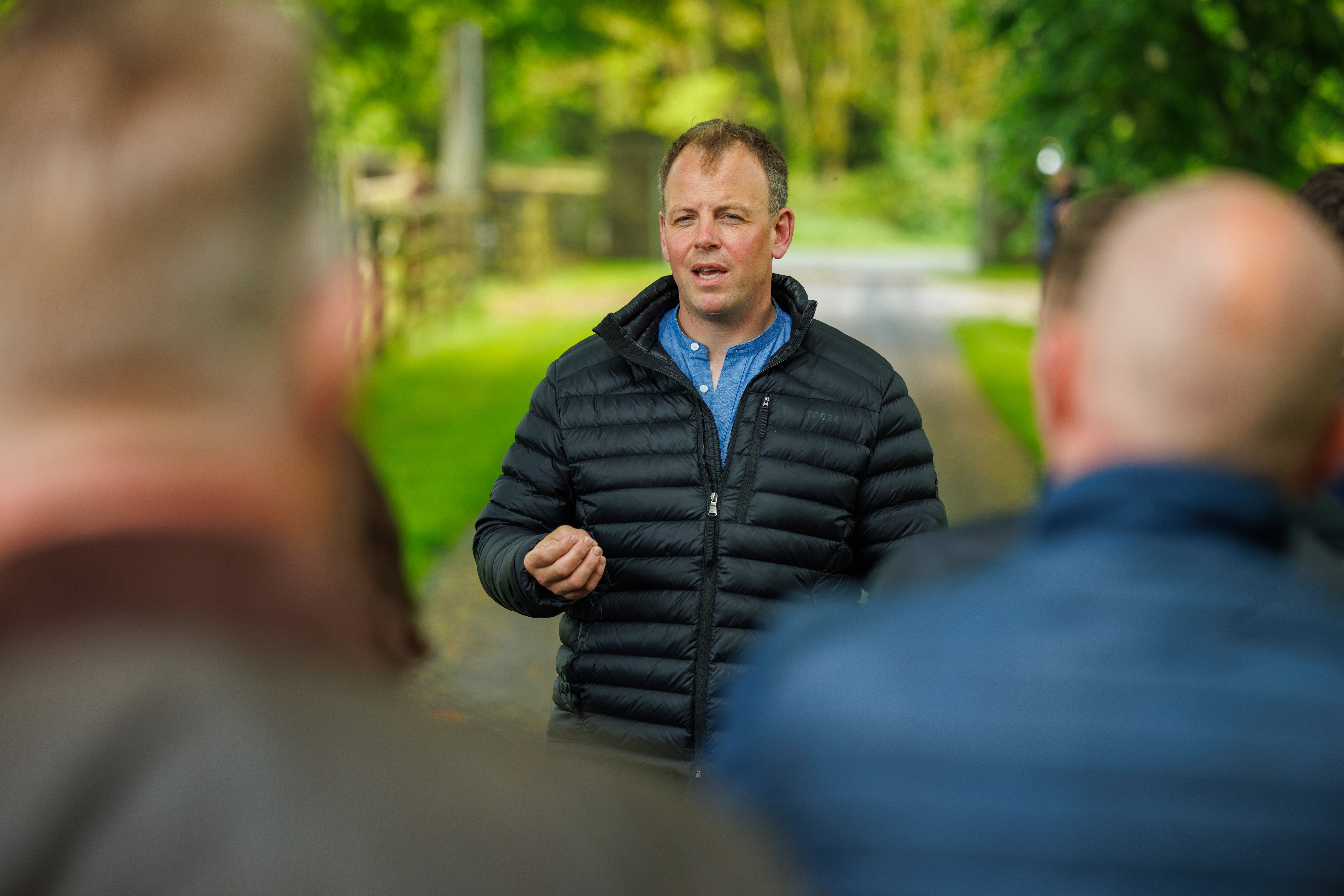 Host farmer John Phelan explaining how he manages the grazing cattle on his farm