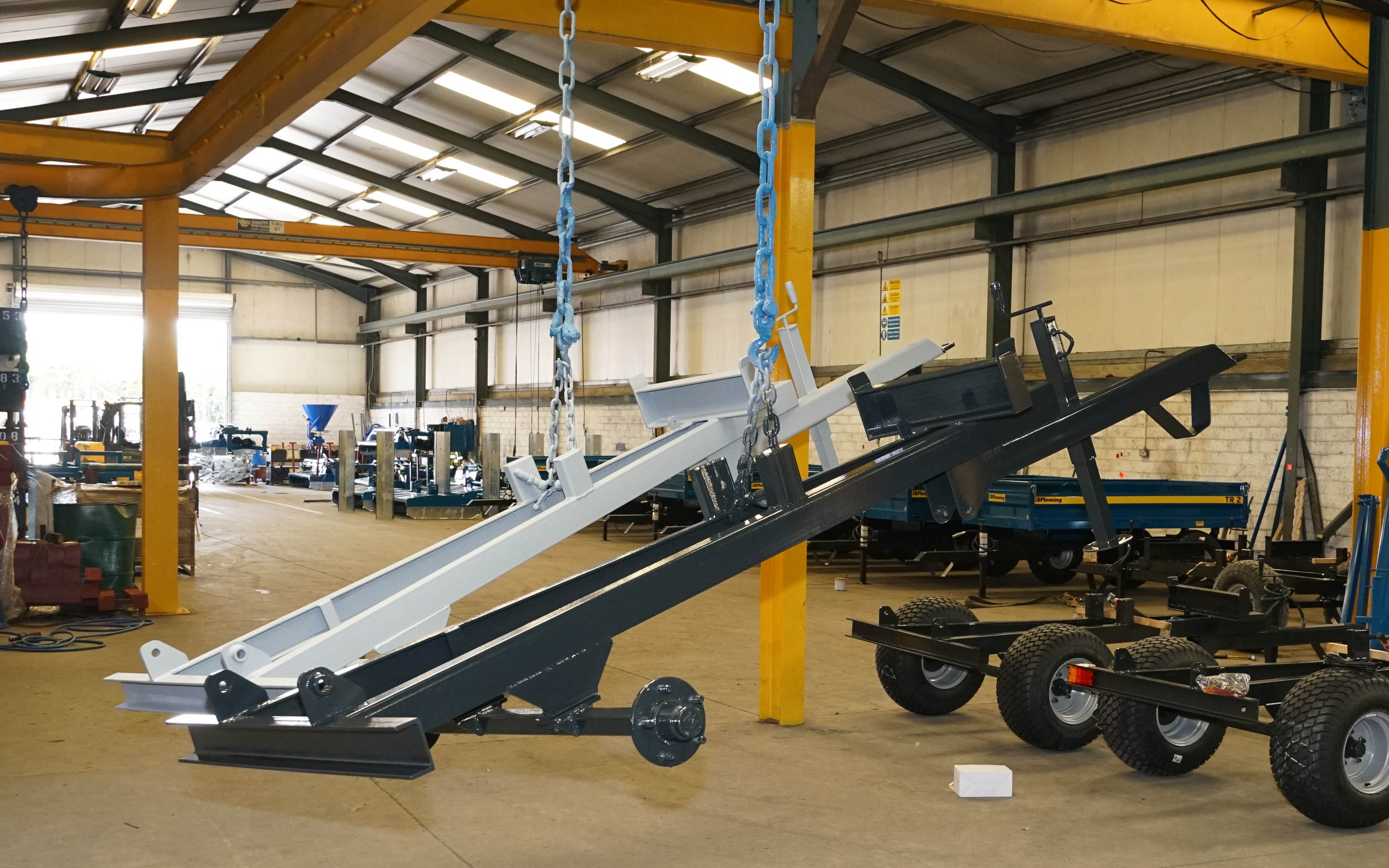 Grey etching primer is applied before a two pack top coat, in this case black for trailer frames