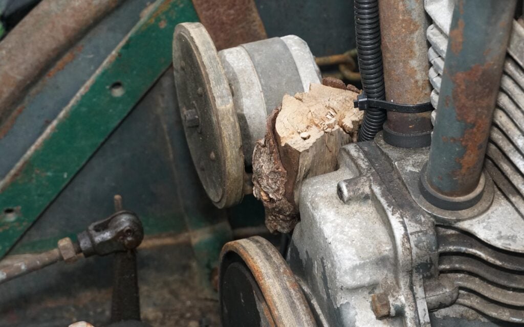 The dynamo has been temporaily disengaged from the flywheel with a block of wood until Brendan finds a more satisfactory arrangement