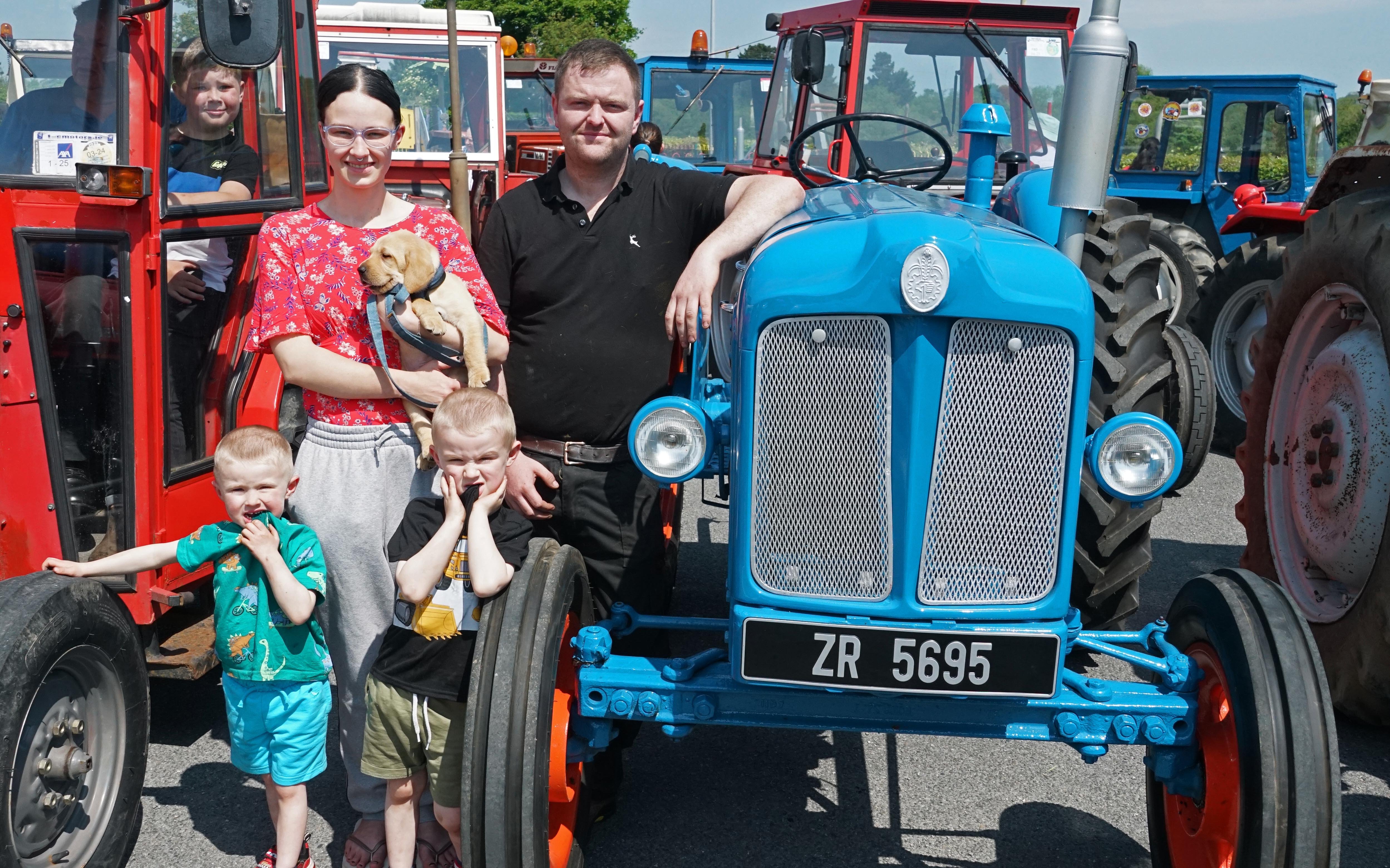 Sarah Connick and Aaron Fitzgerald with his restored Fordson Major, with sons (l-r) Jake and Jack. Eight-week-old Rex was also brought along for the day