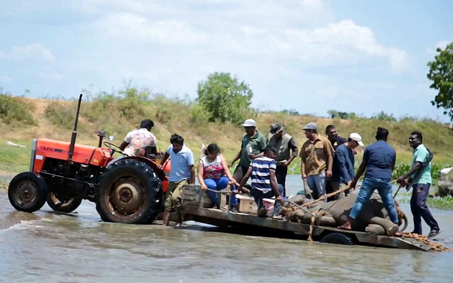 TAFE tractors are sold worldwide, here in Sri Lanka a TAFE helps save a baby elephant in 2018
