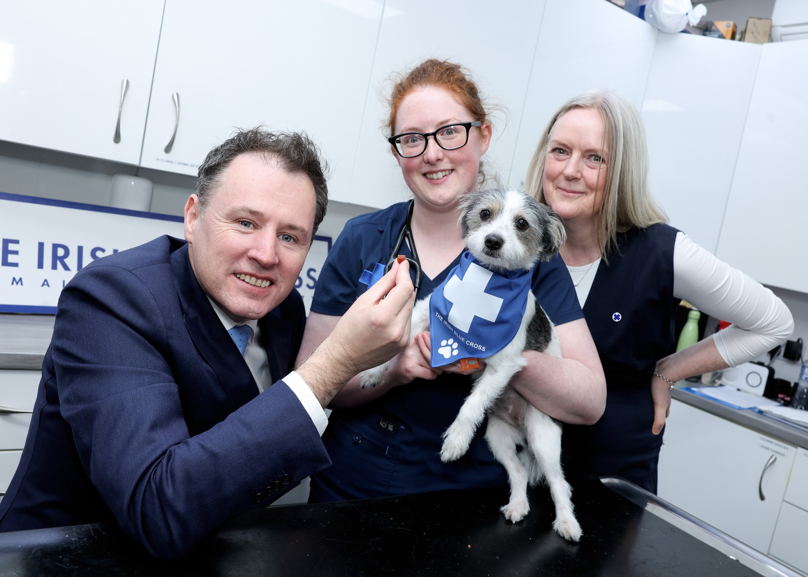 Minister for Agriculture, Food and the Marine Charlie McConalogue with Ciara Sweeney, vet surgeon with The Irish Blue Cross and Chris Conneely, chief executive of The Irish Blue Cross