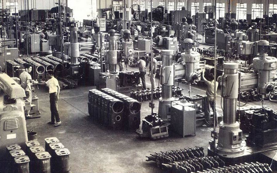 Most likely to be from the 60s, this image shows what looks to a modern factory for its time