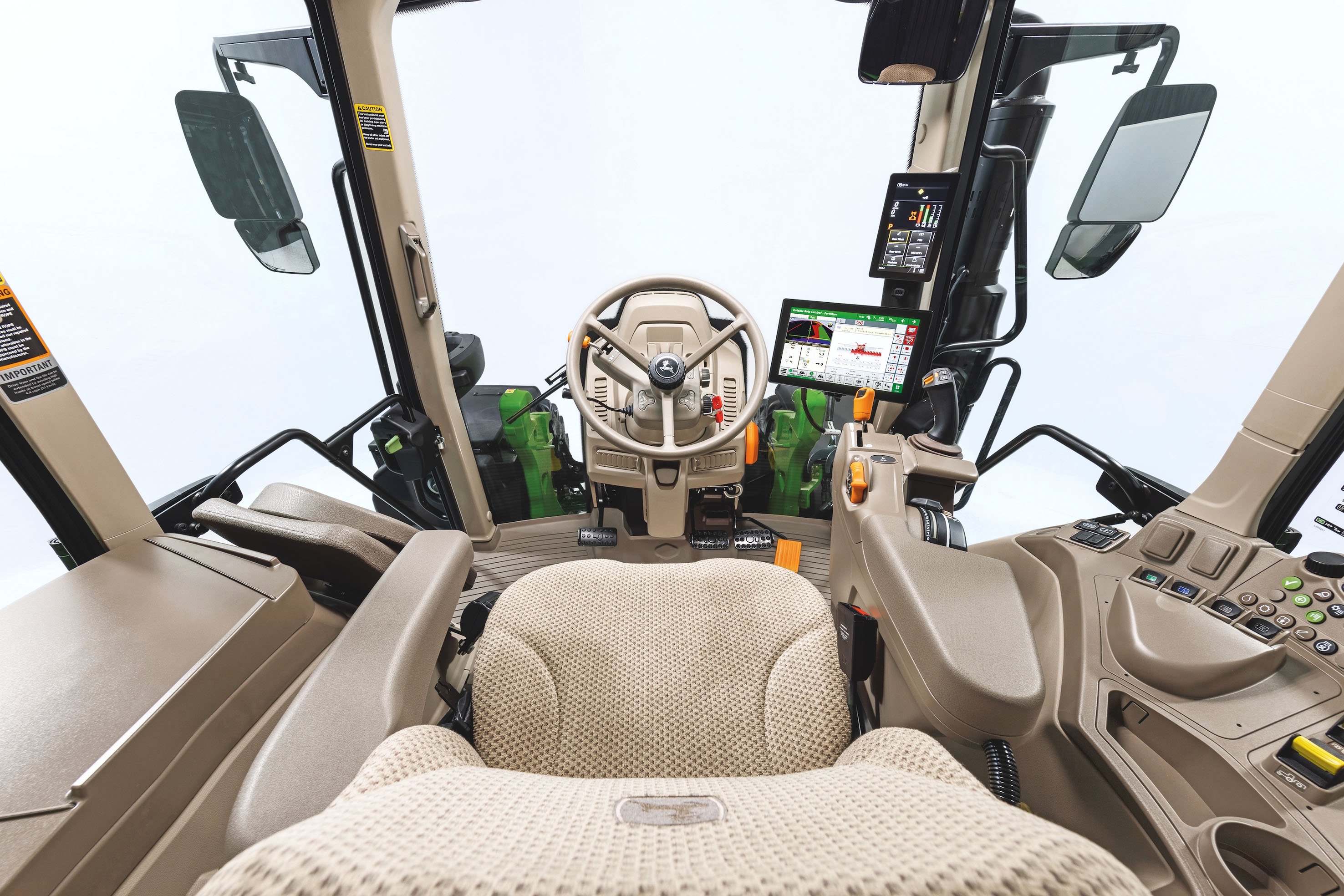 Forward visibility is enhanced by having instruments gathered on cab pillar