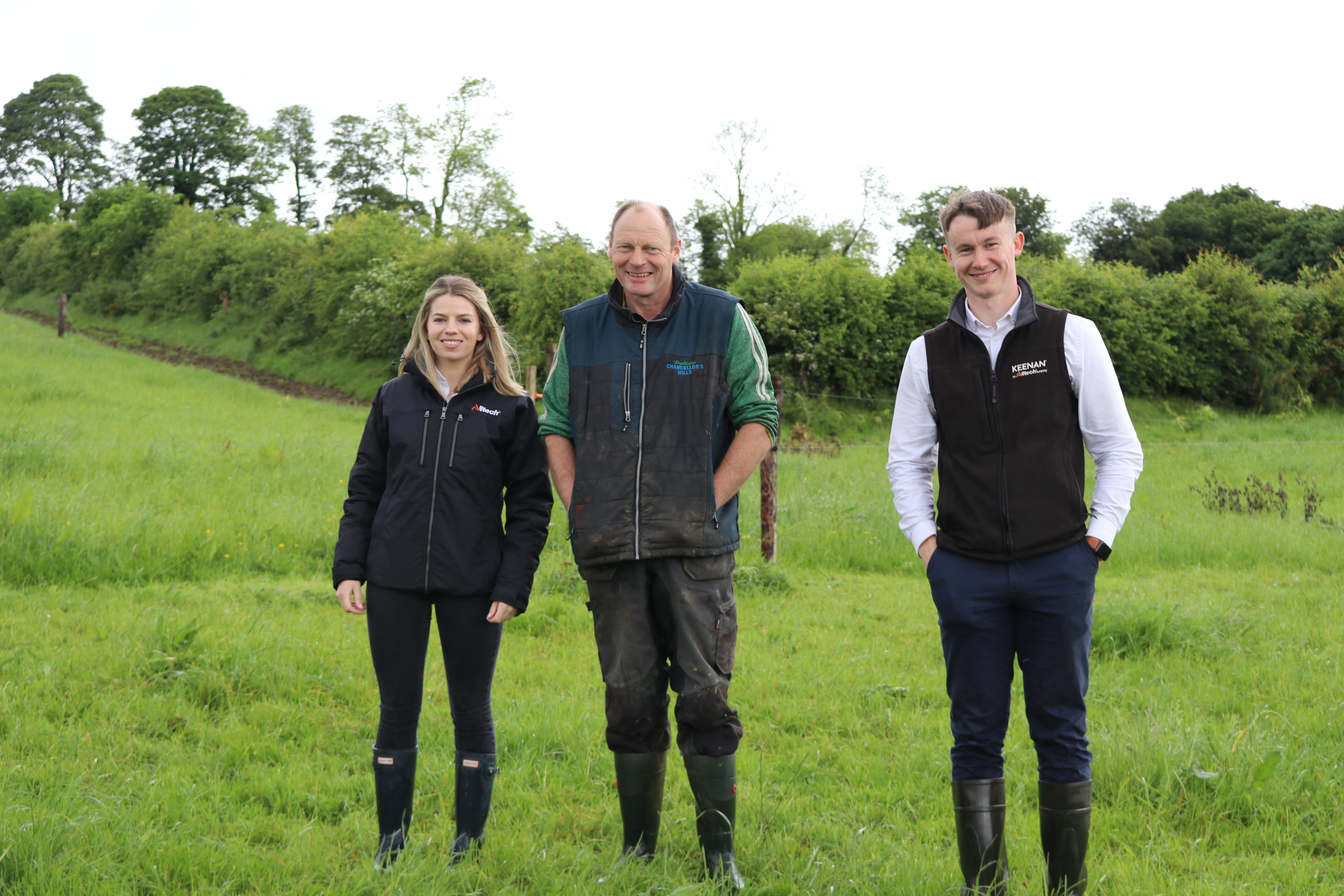 InTouch nutritionist, Emma Swan, Damein Moore and KEENAN Ireland sales manager, Adam Hanratty walk the grazing platform at Damien's farm