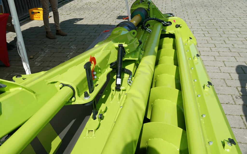 The tapered auger sits within a shaped casing that allows more crop to be carried the closer it is to the centre