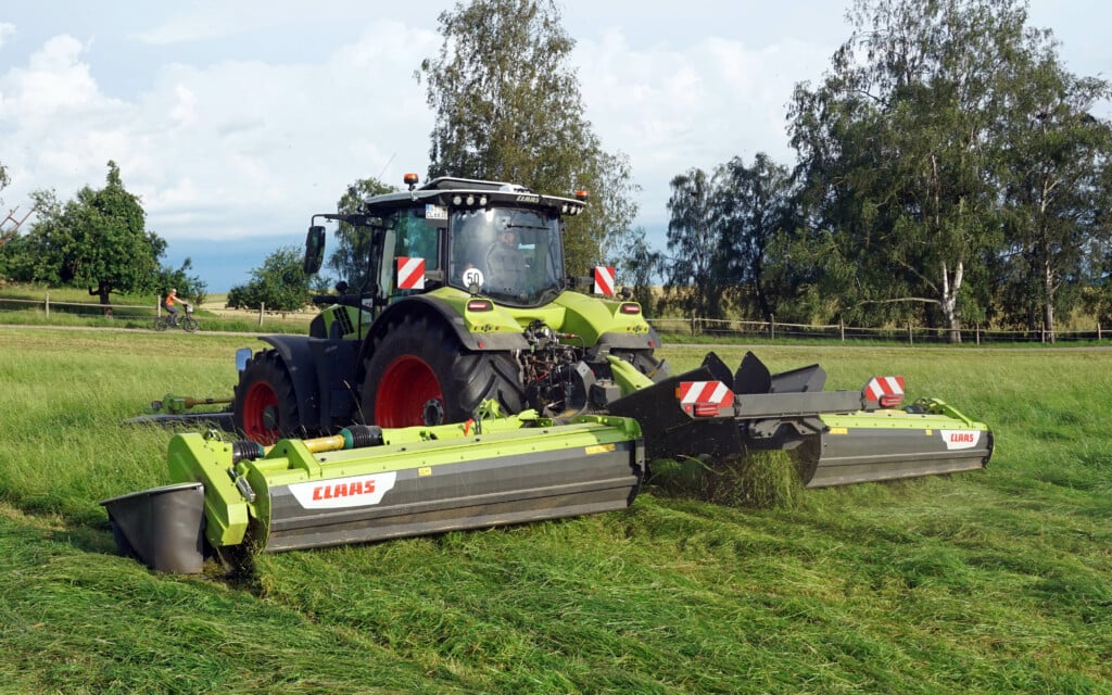 With the augers lifted out of work the crop is left as a full width swath