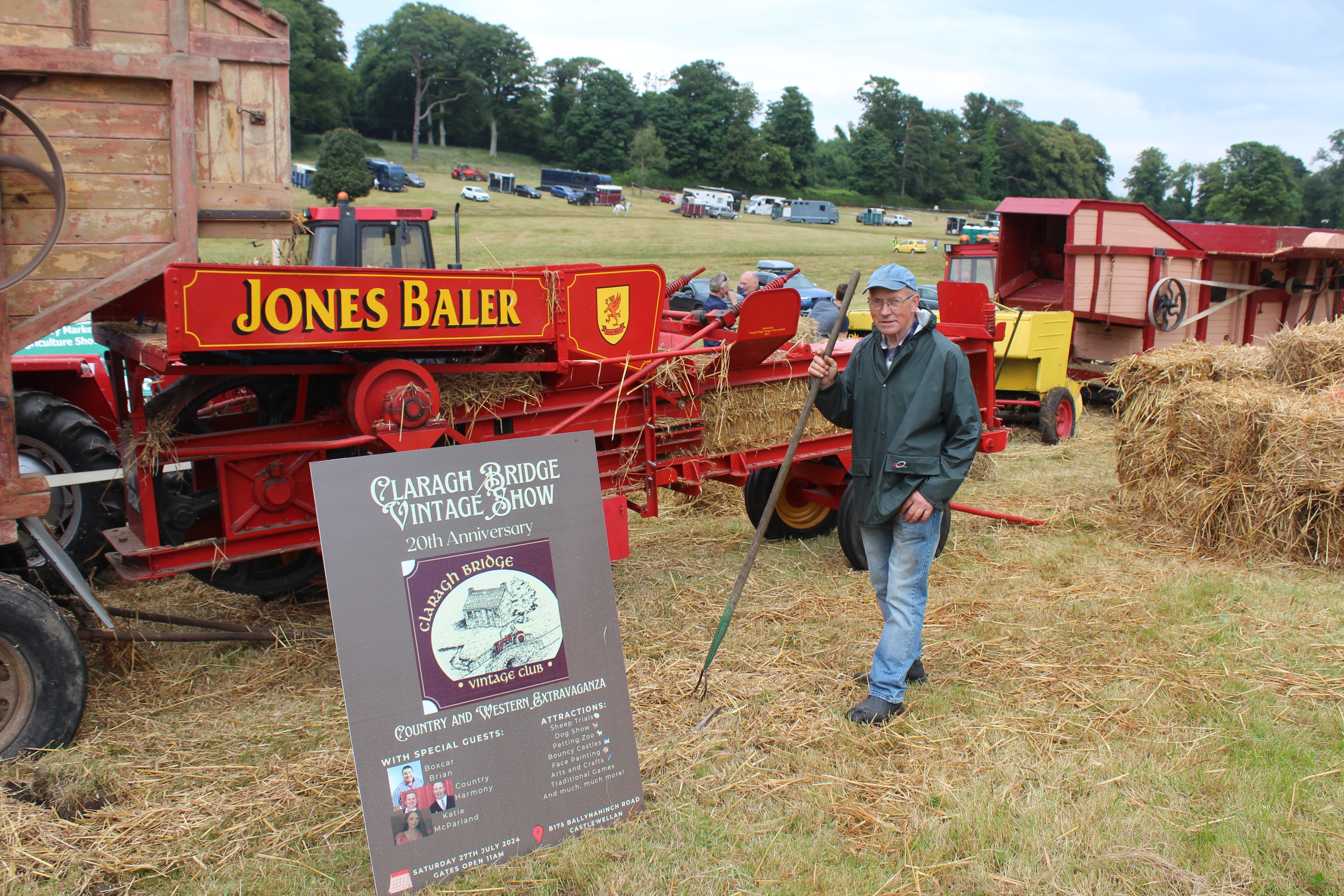Patrick Murray stands in front of a Jones' baler at Cstlewellan Show 2024