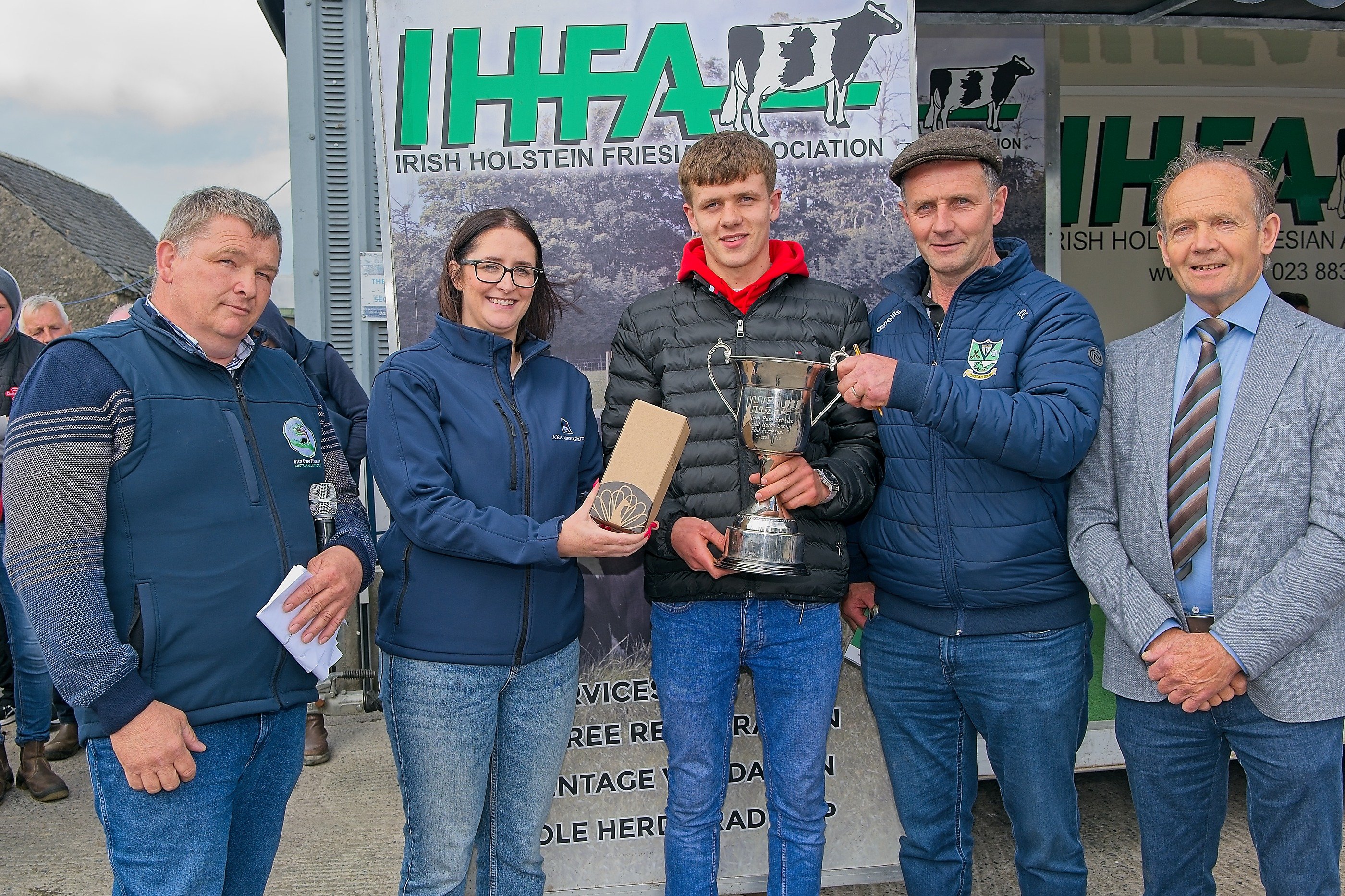 (L-r:) Irish Pure Friesian Club chair, Paddy Quealy; Kim Norton of Axa, Herds Competition winner John and Jack O’Connor and IHFA president John O’Sullivan
