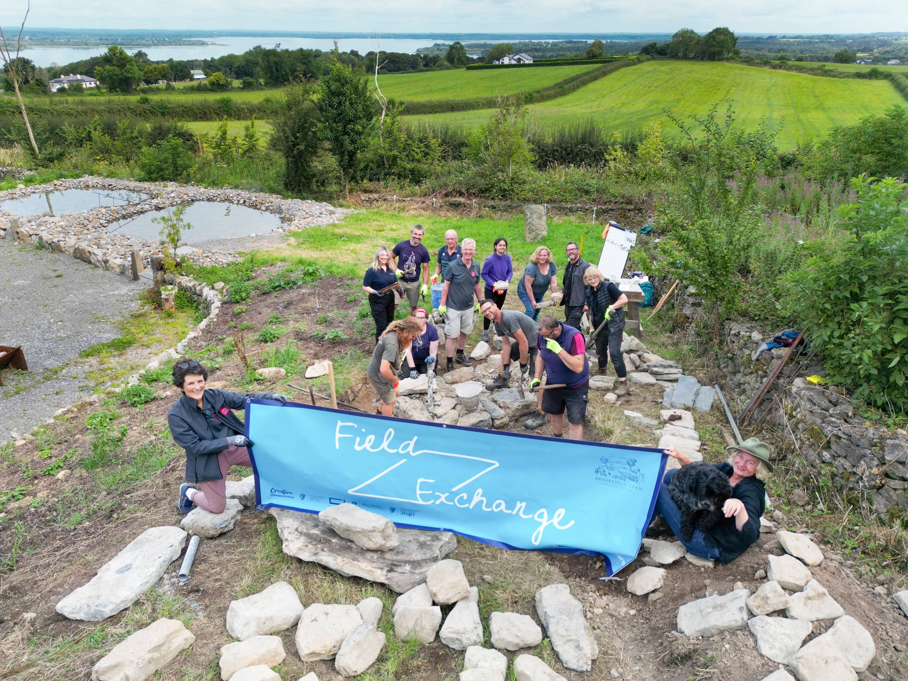 View of the Field Exchange moss bench being constructed by Field Exchange participants