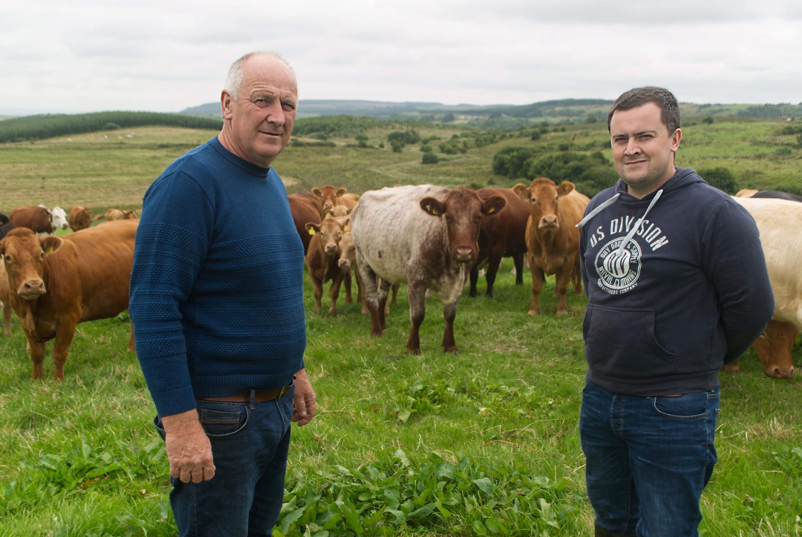 Father and son Micheal and Eoin Collins on their farm in Kilfenora, Co. Clare