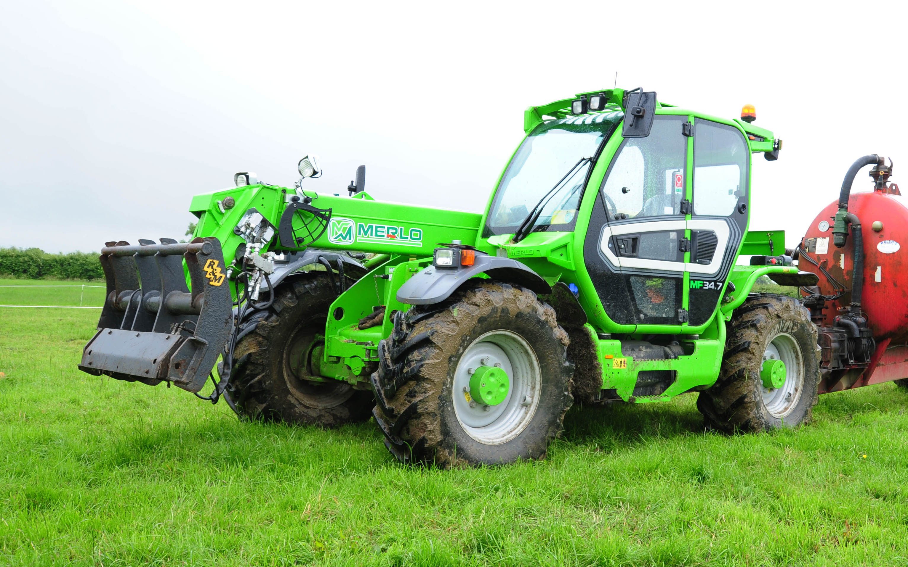 The Merlo Multifarmer is sold as a loader that can help out with tractor tasks