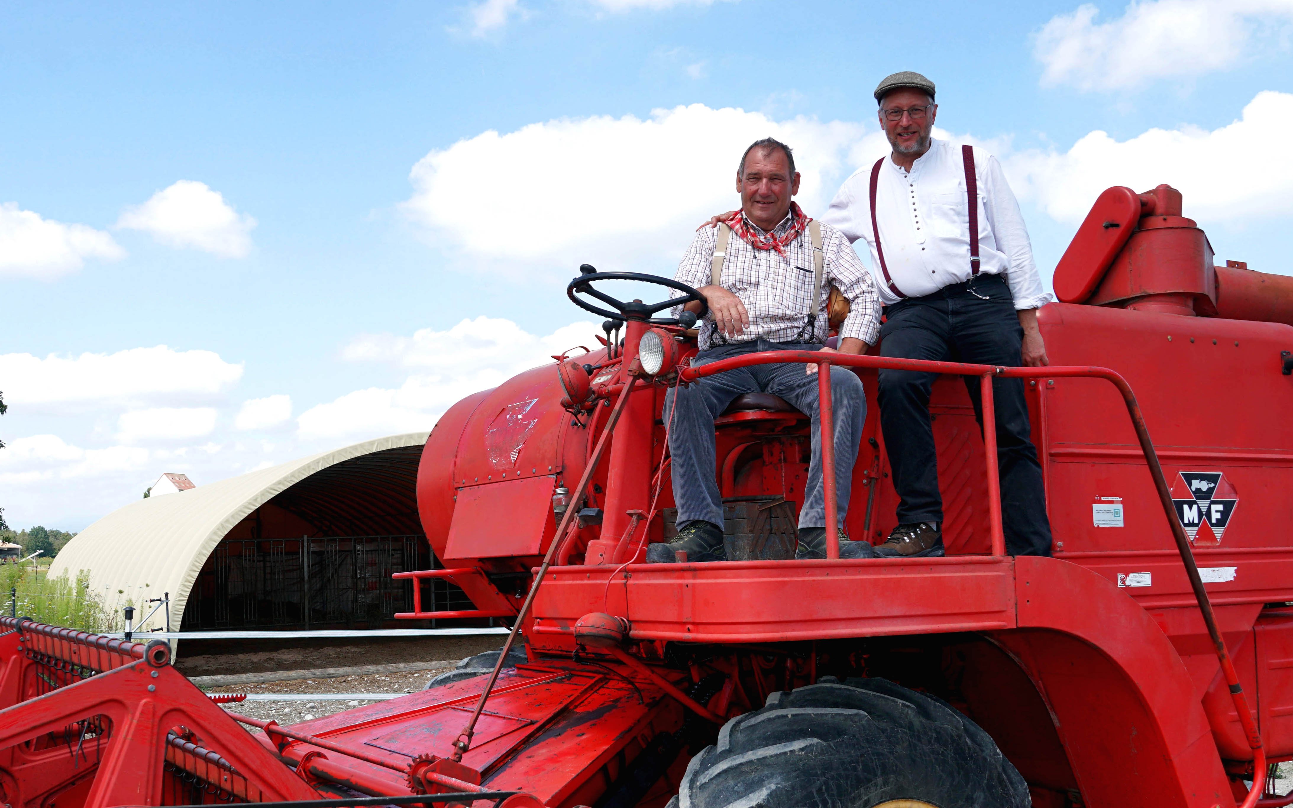 (L-r:) Arsene Fricker and Albert Kuhnstetter are the two very knowledgeable combine collectors who were the force behind putting together the harvest event