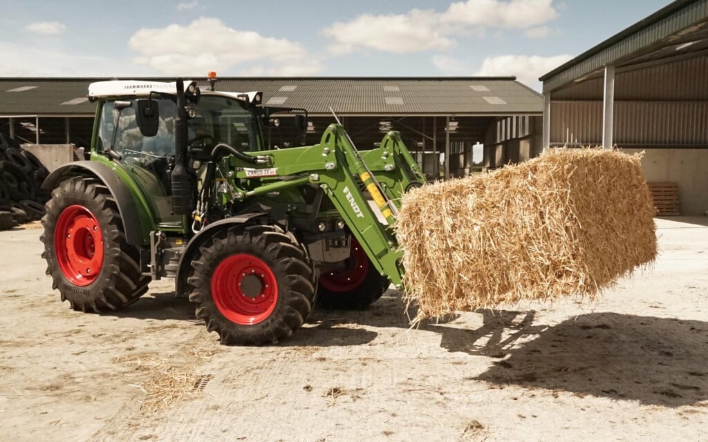 Fendt's own front end loader is mounted well forward of the cab, allowing the windscreen to be opened in the continental fashion