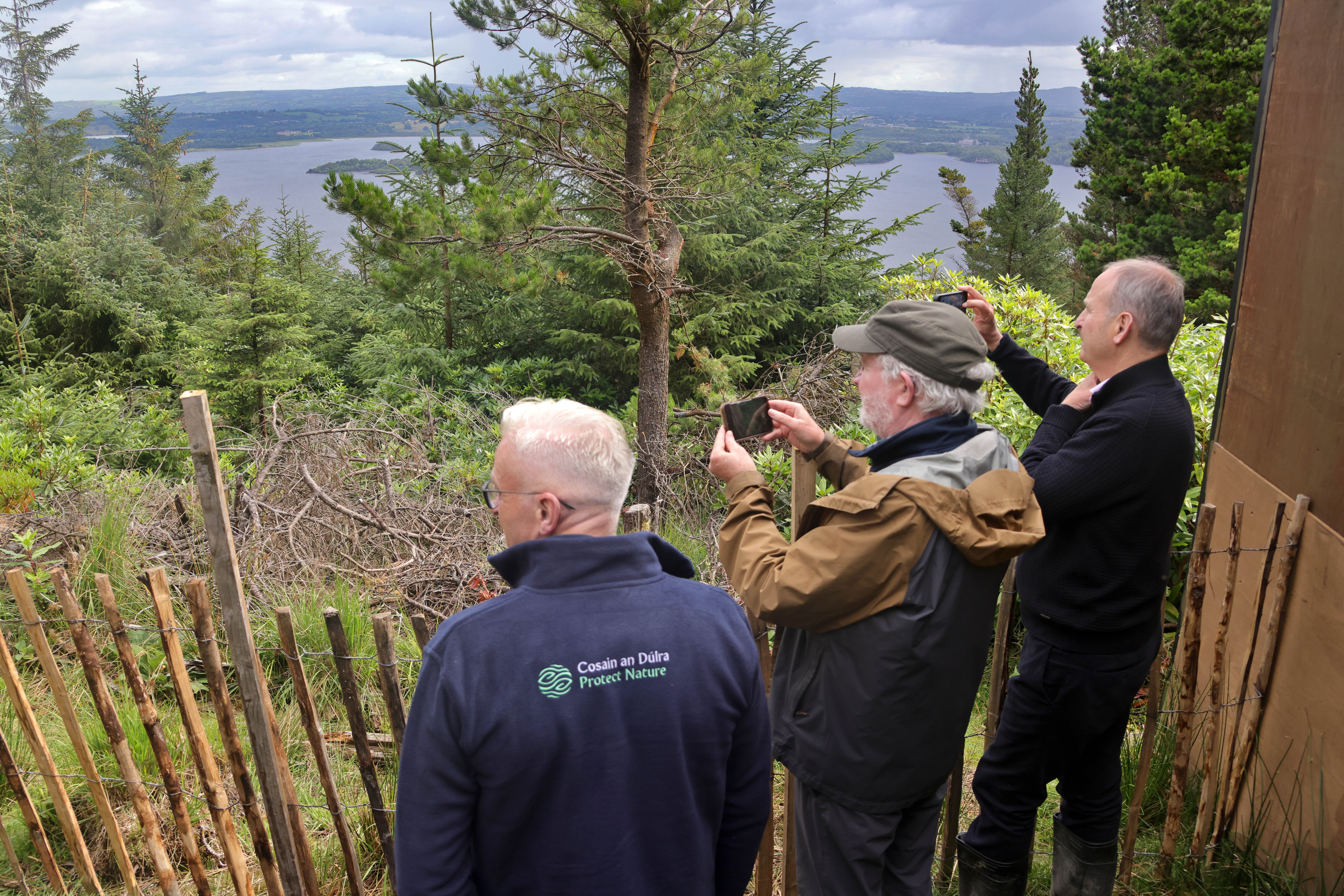 Tánaiste Michéal Martin (right), along with Minister for Nature, Heritage and Electoral Reform Malcolm Noonan (centre) with Niall Ó Donnchú, NPWS director general (left) Image Source: Valerie O'Sullivan