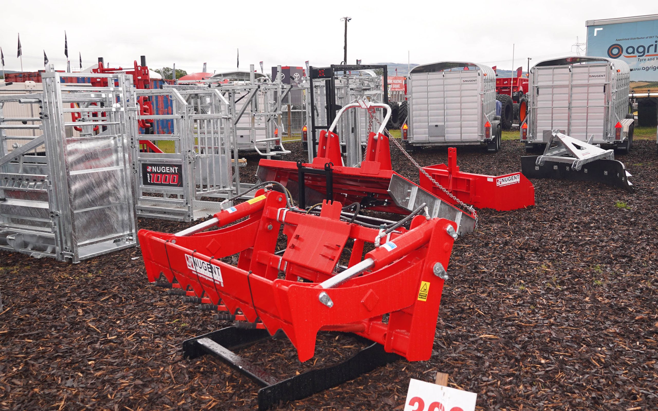 Silage grabs and toppers now vie for space with road trailers in the Nugent display