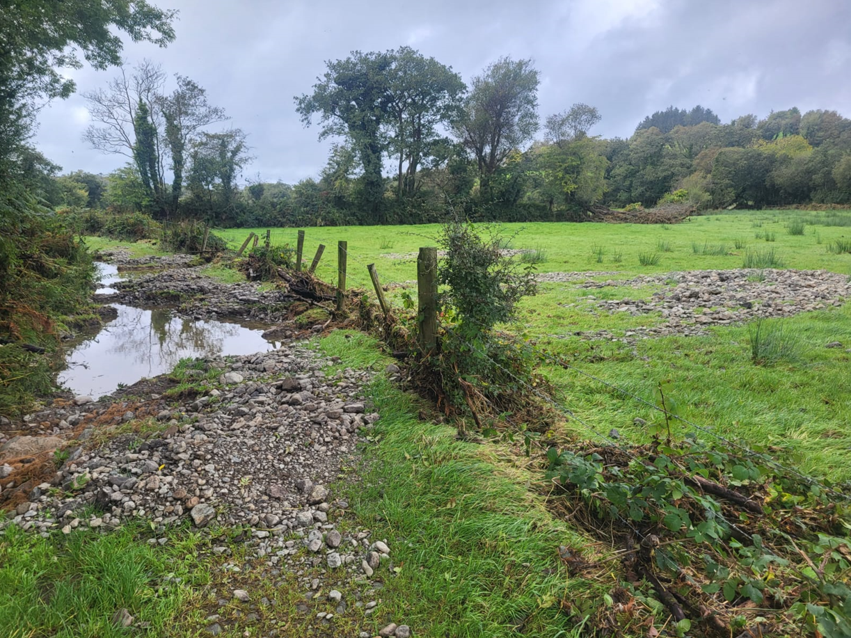 Farm roads and fencing were damaged by the severe flooding. Image Source: Helen O'Sullivan
