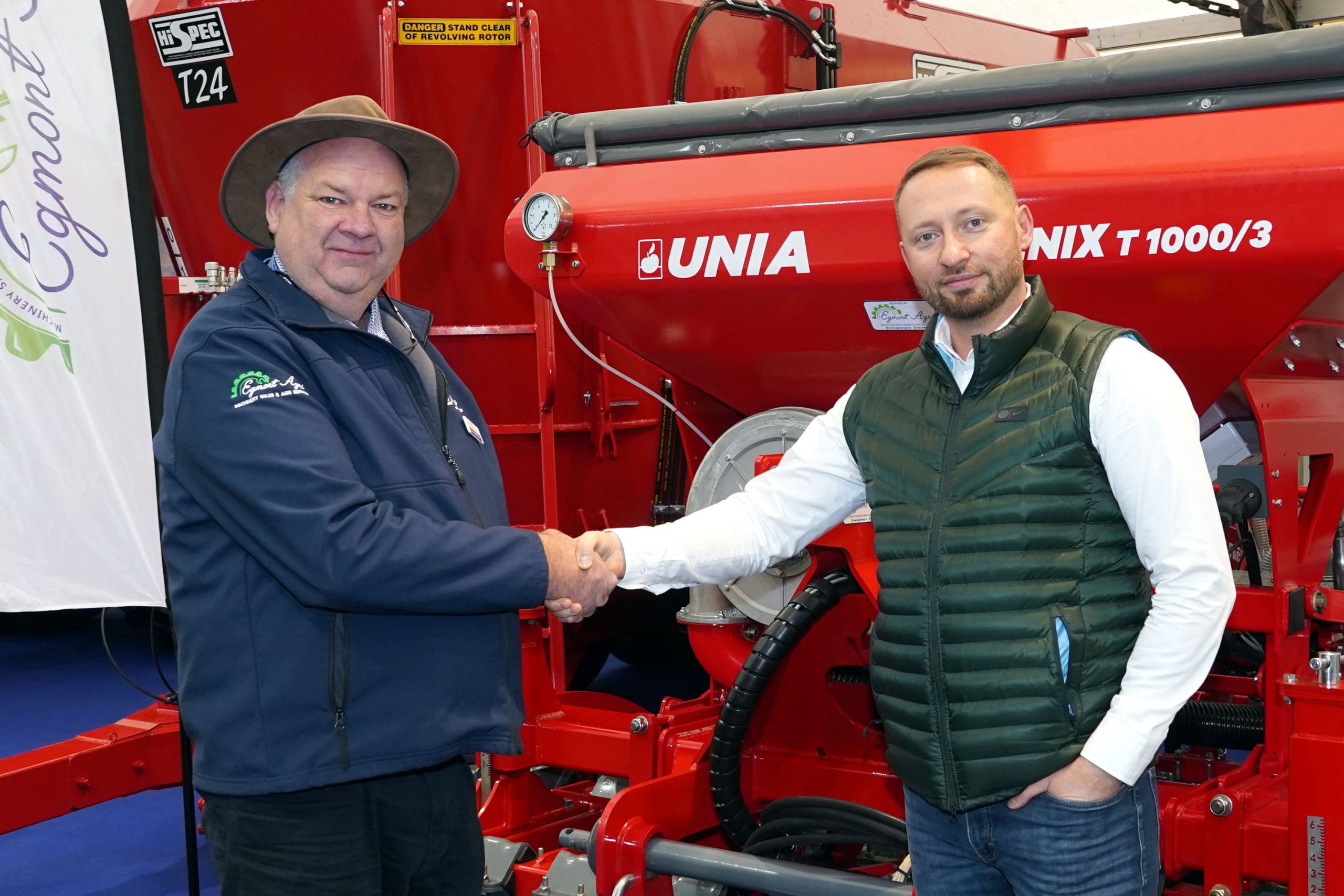 (L-r:) Timmy O'Brien and Lukasz Krwaczuk of Unia shake hands on the new distribution deal between their two companies