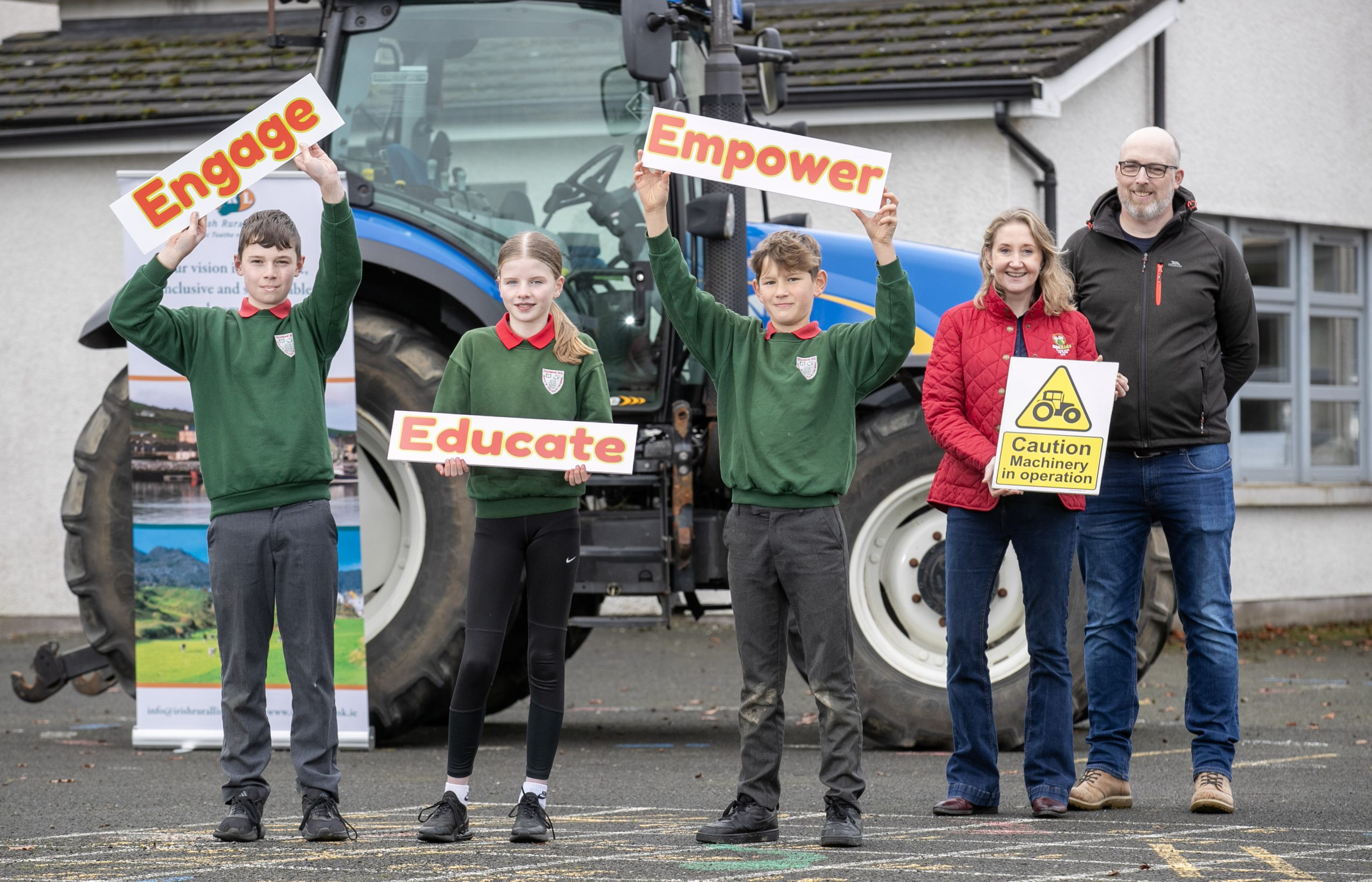 Pupils: Reuben Reed; Leah McCullagh; and Daniel Carleton, from Clontibret NS, Co. Monaghan, with founder of Agrikids, Alma Jordan and mentor from Farmers4Safety with Irish Rural Link, John Murphy.Image source: Finbarr O'Rourke