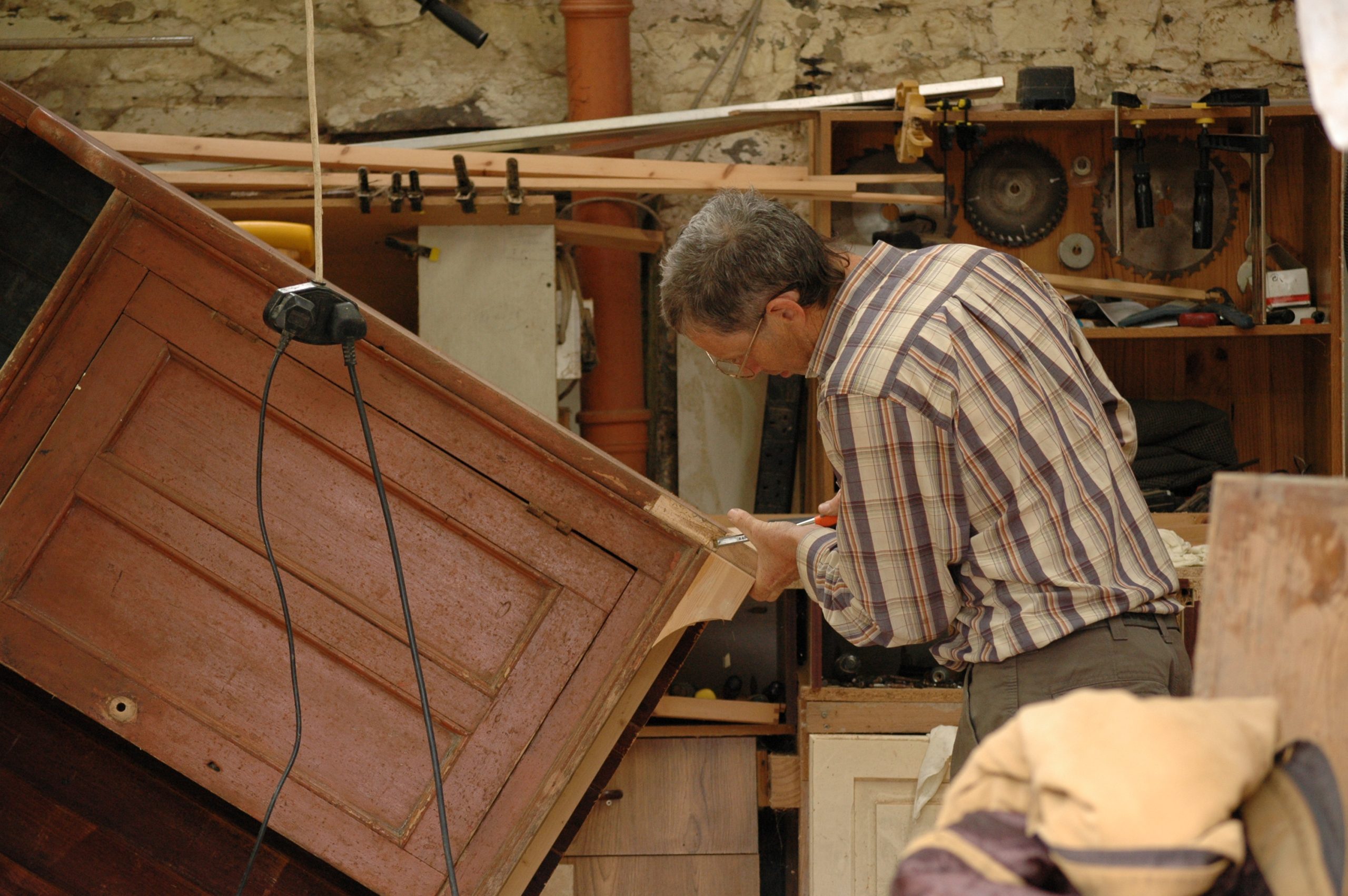 Gleeson working on a dresser
