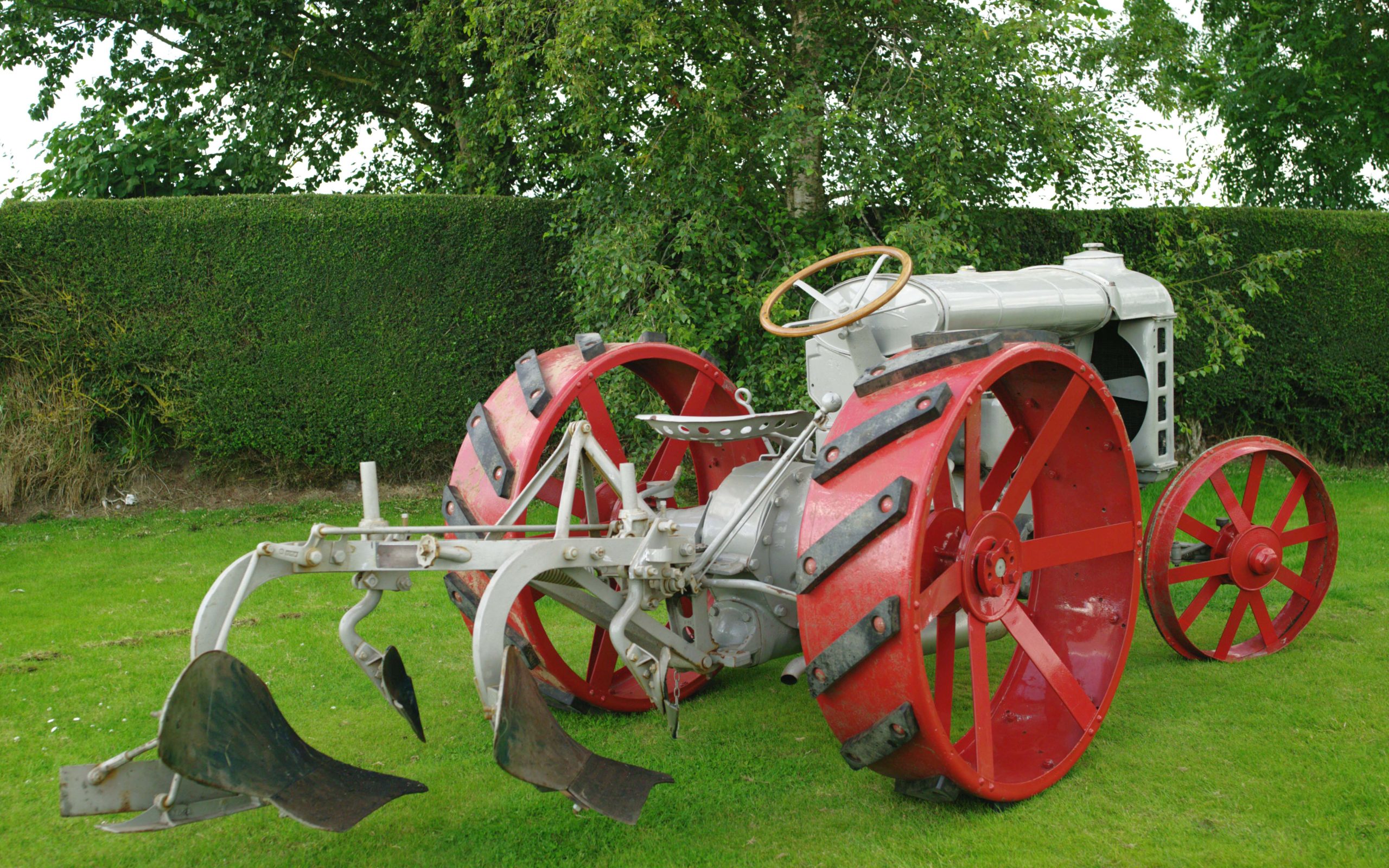 Ploughs were at first just dragged along behind the tractor although early attempts to make a direct connection were made