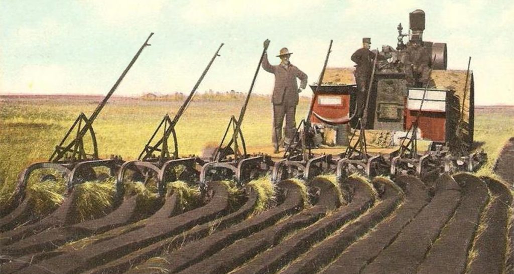Ploughing the prairie with traction engine and drag plough; note the wide drive wheels to help prevent bogging down