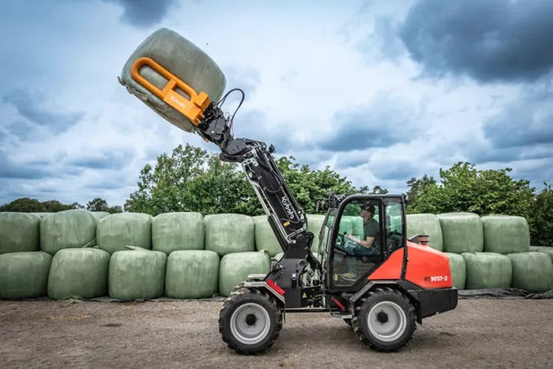 Kubota is now moving into the mainstream with loaders that can handle silage bales with ease