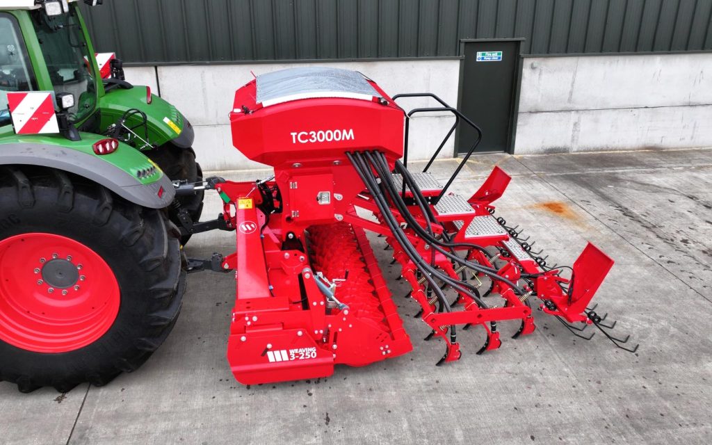 Improvements to the Weaving tine drill include an enlarged hopper