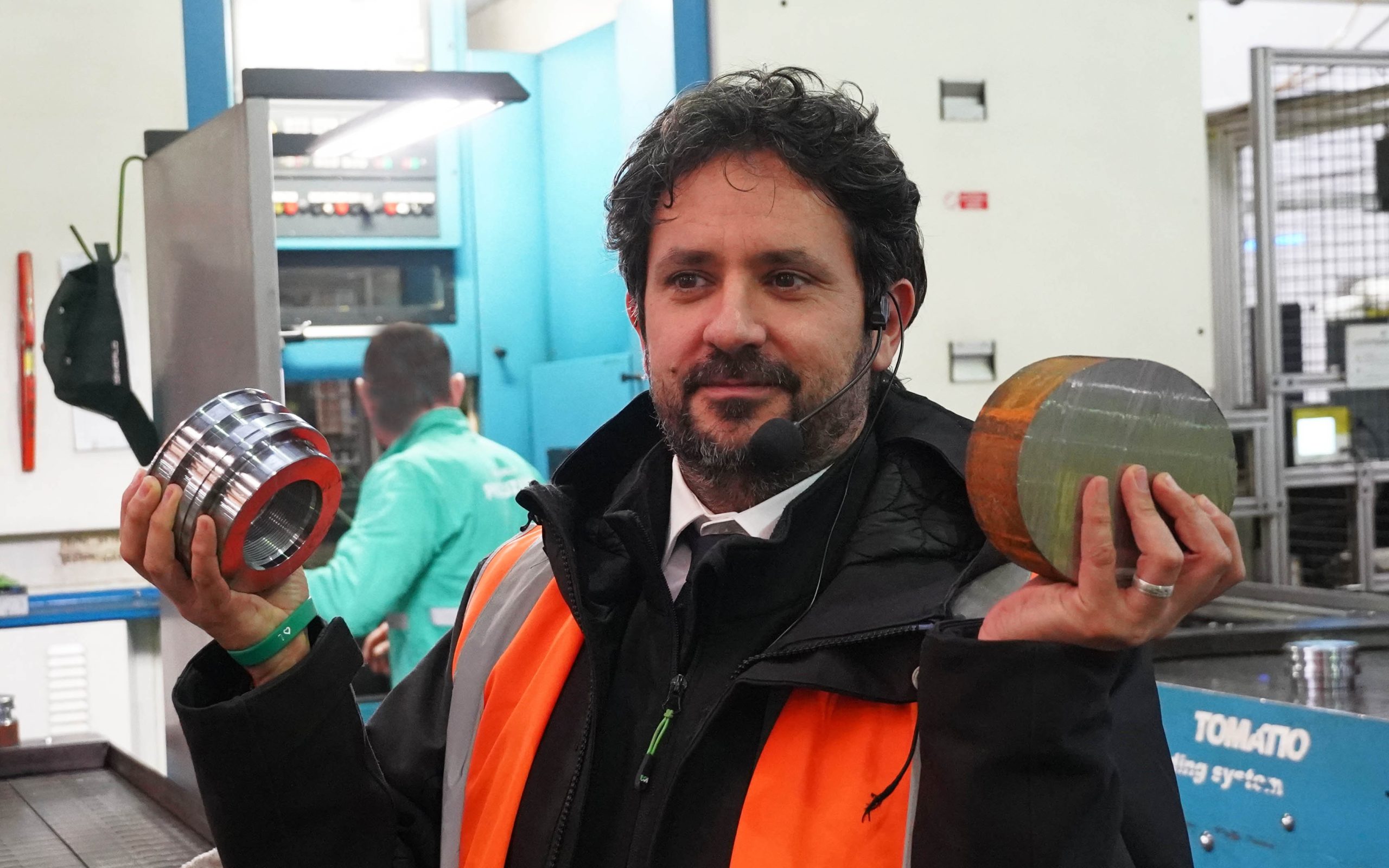 Mattia Bodino of the Merlo Group with finished component and blank from which it is machined