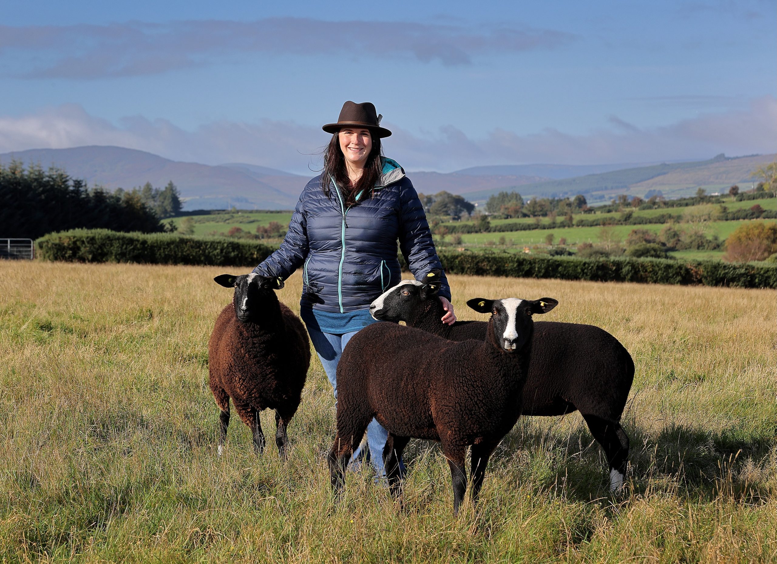 Farmer, Sophie Nicol, with some of her Zwartbles sheep at Windrush farm. Image source: Frank McGrath