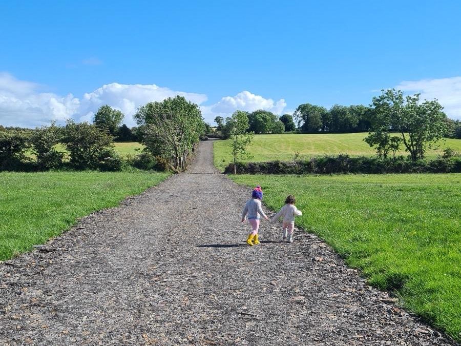 Denis' children enjoying the good weather on the freshly renovated laneways