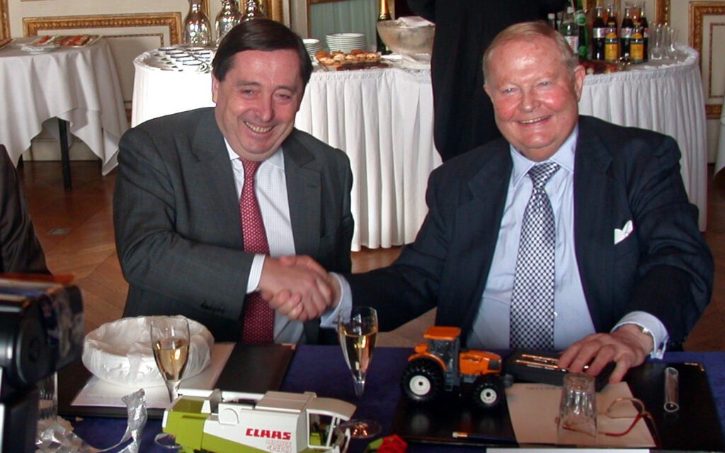 Patrick Faure of Renault  (left) and Helmut Claas agree on the deal in 2003